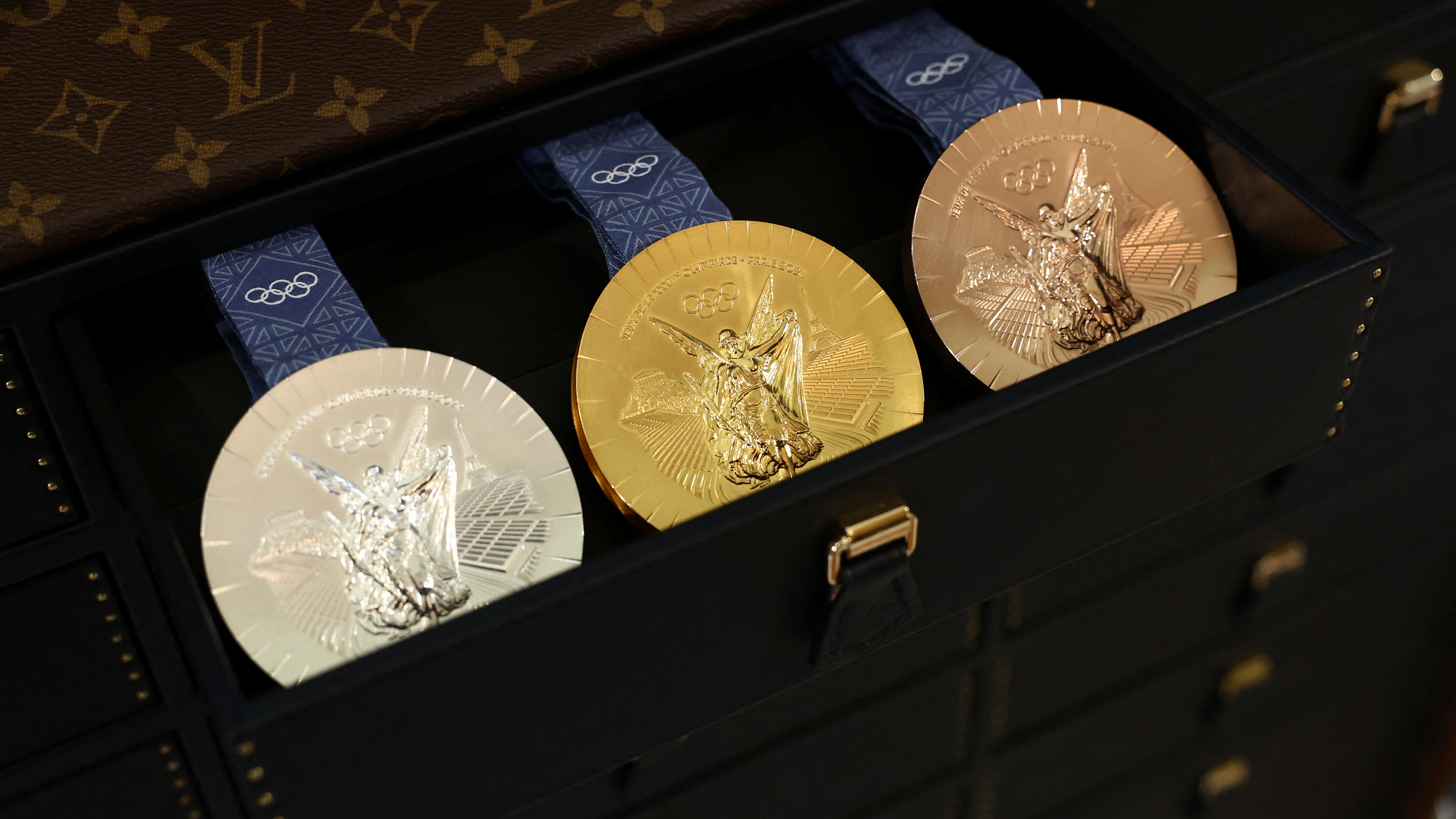 Olympic gold, silver and bronze medals in a Louis Vuitton trunk, which will transport and protect them during the Paris 2024 Olympic and Paralympic Games. /Stephanie Lecocq/Reuters