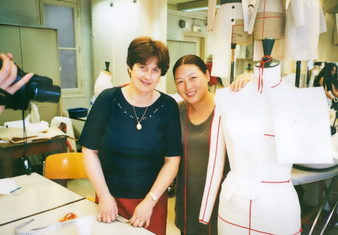 Liang Zi studied tailoring in France in 1999 /Liang Zi