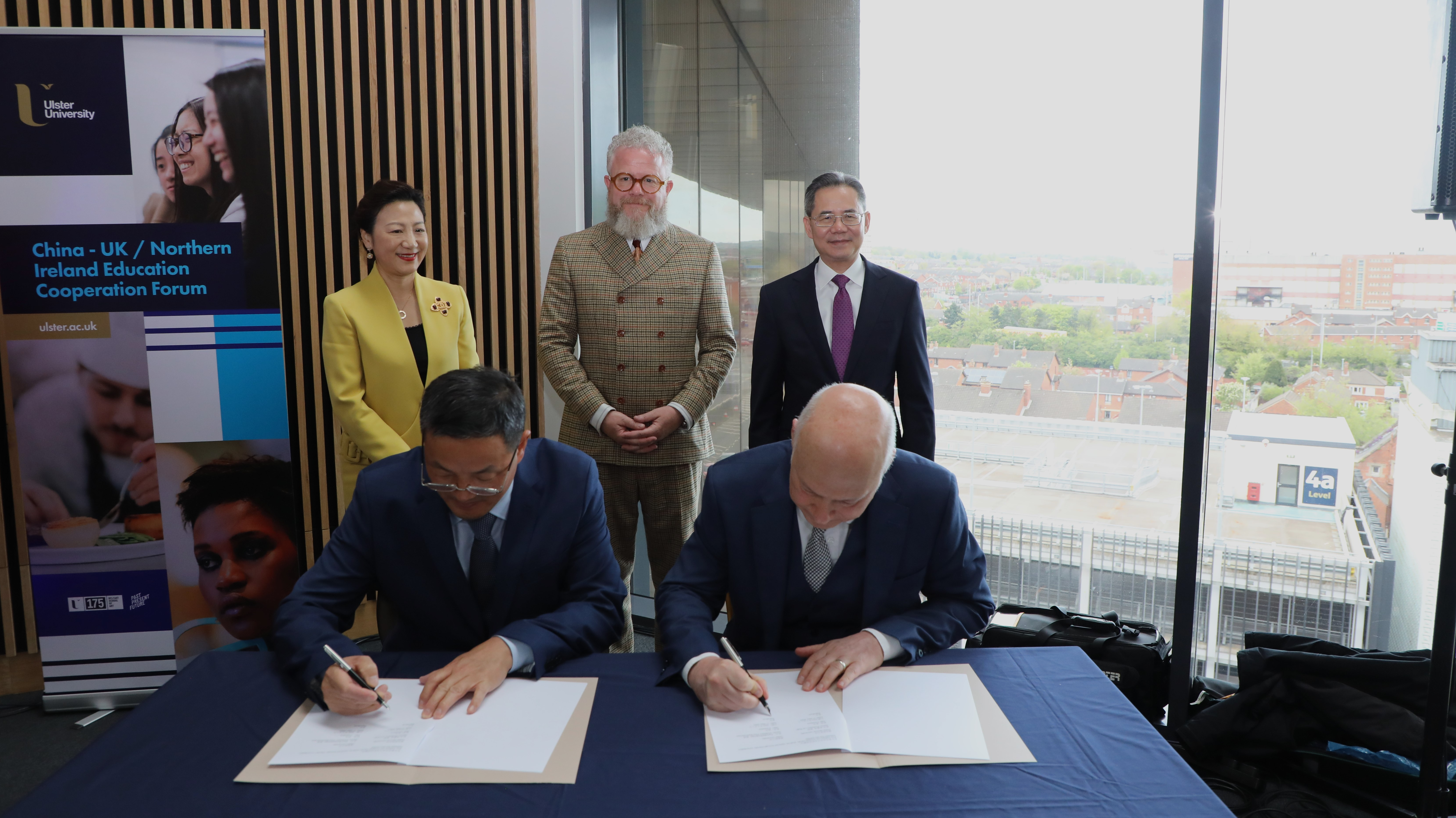 Representatives sign partnership in Belfast at the first China-UK Northern Ireland Education Cooperation Forum. /Yan Kai, Chinese Embassy in the UK