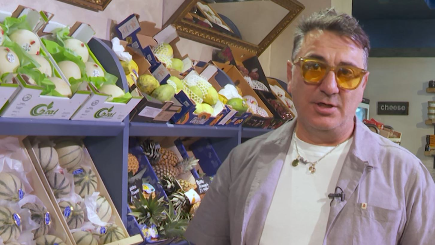 Shop owner Andreas Georghiou has hit out at the red tape surrounding imports of food. /CGTN Europe