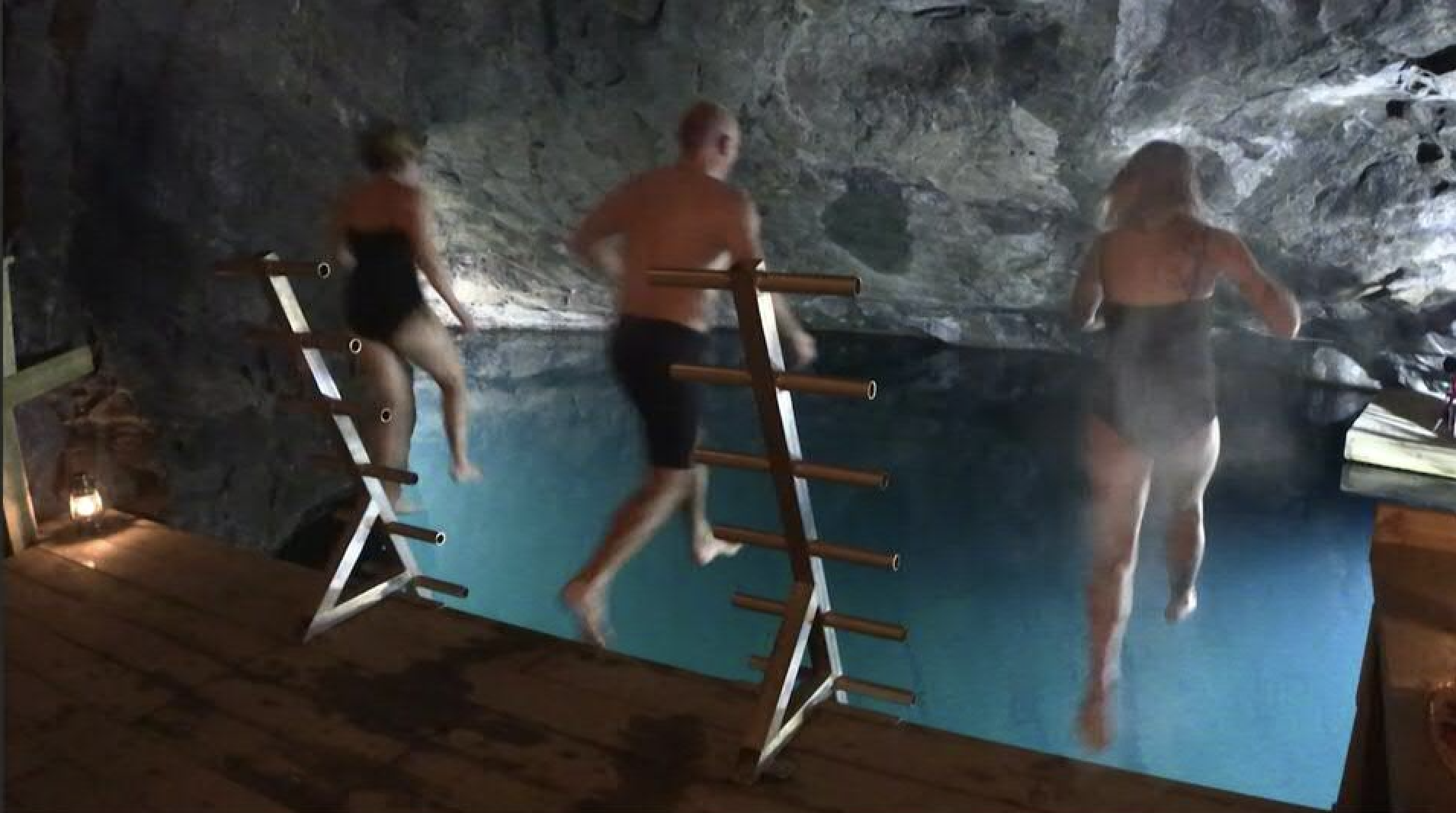 Deep underground in a disused iron mine, sauna goers can compliment their steam with a dip in a crystal clear turquoise lake. /AFP
