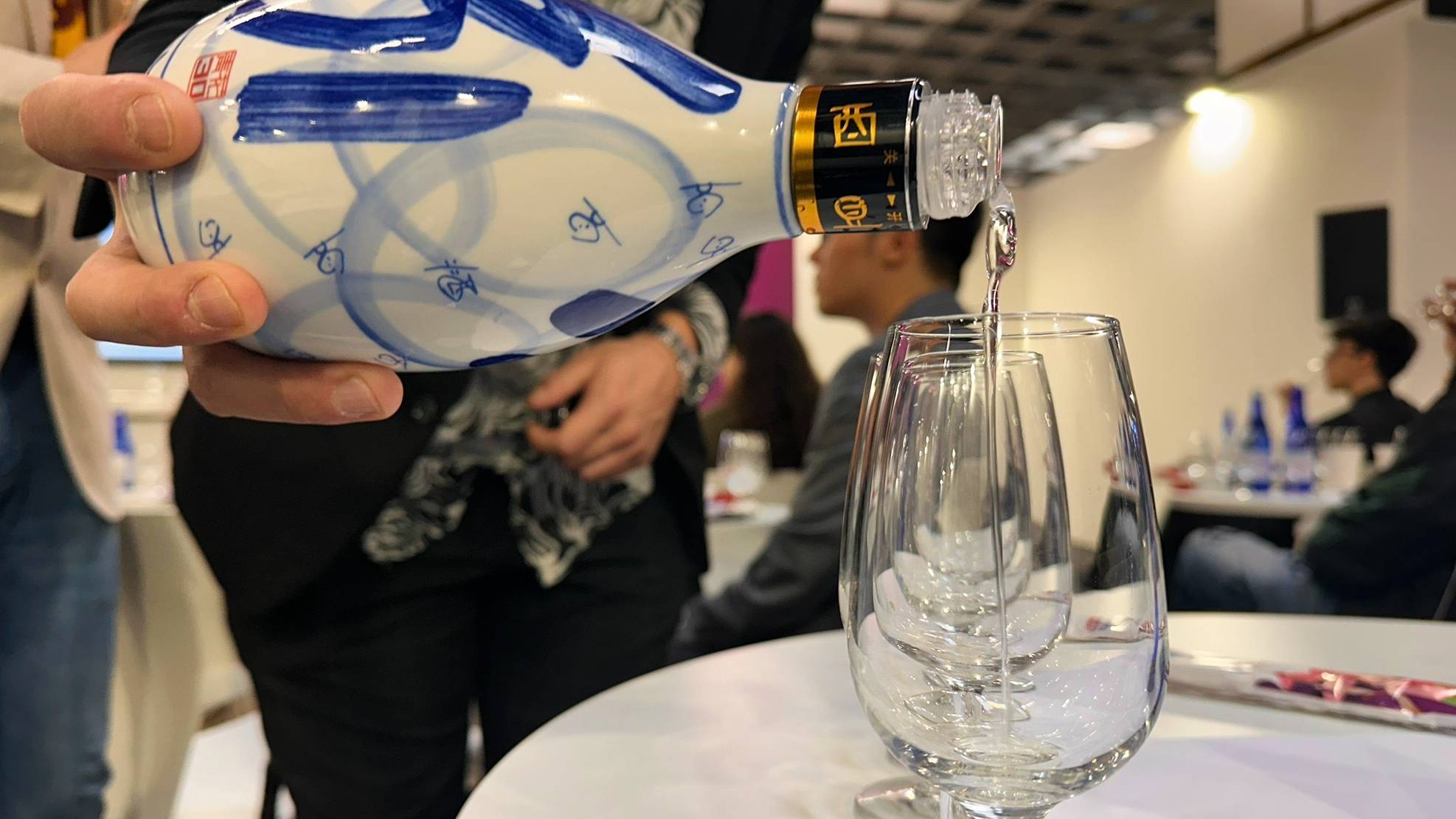 The trick to Baijiu tasting is to smell it and not to drink too much because the alcohol is so strong. /CGTN Europe