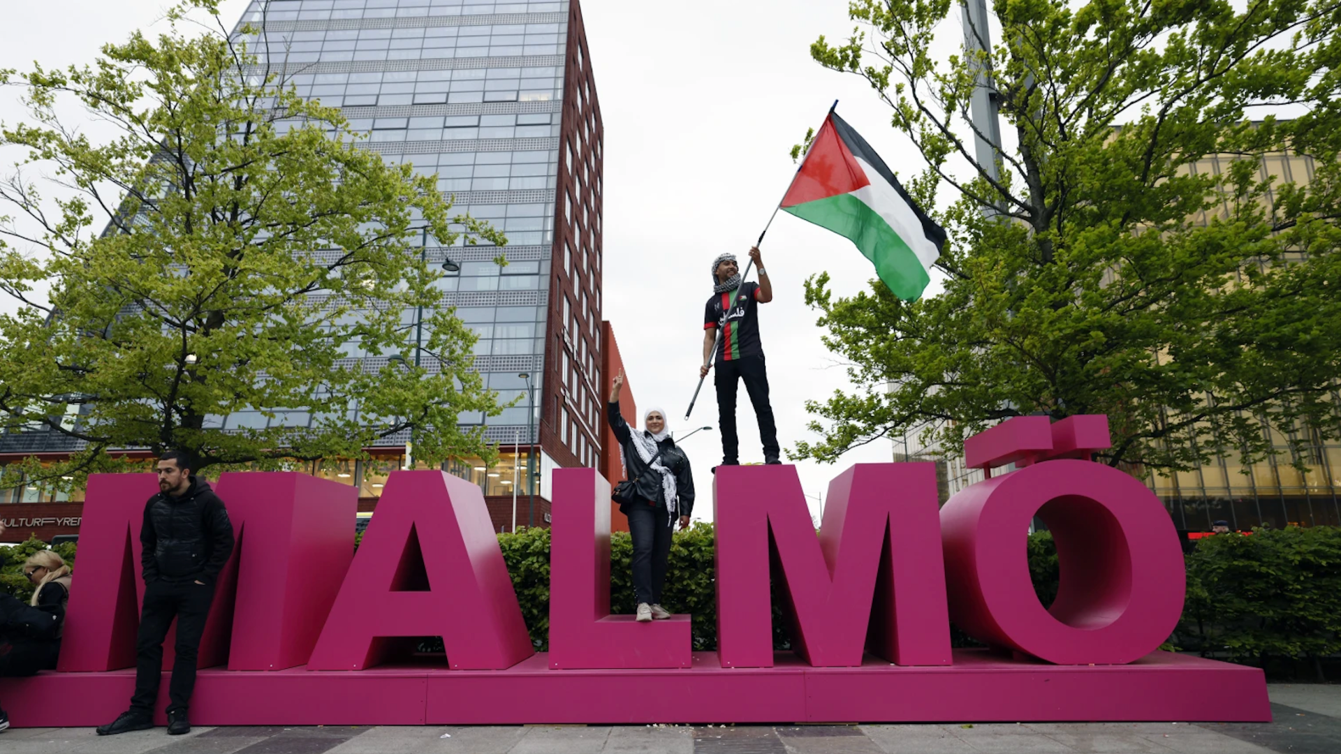 Pro-Palestinian protester waves a Palestinian flag at Hyllie arena ahead of the second semi-final of the 68th edition of the Eurovision Song Contest at Malmö Arena, in Malmö, Sweden, Thursday, May 09, 2024. /Andreas Hillergren/TT News Agency via AP
