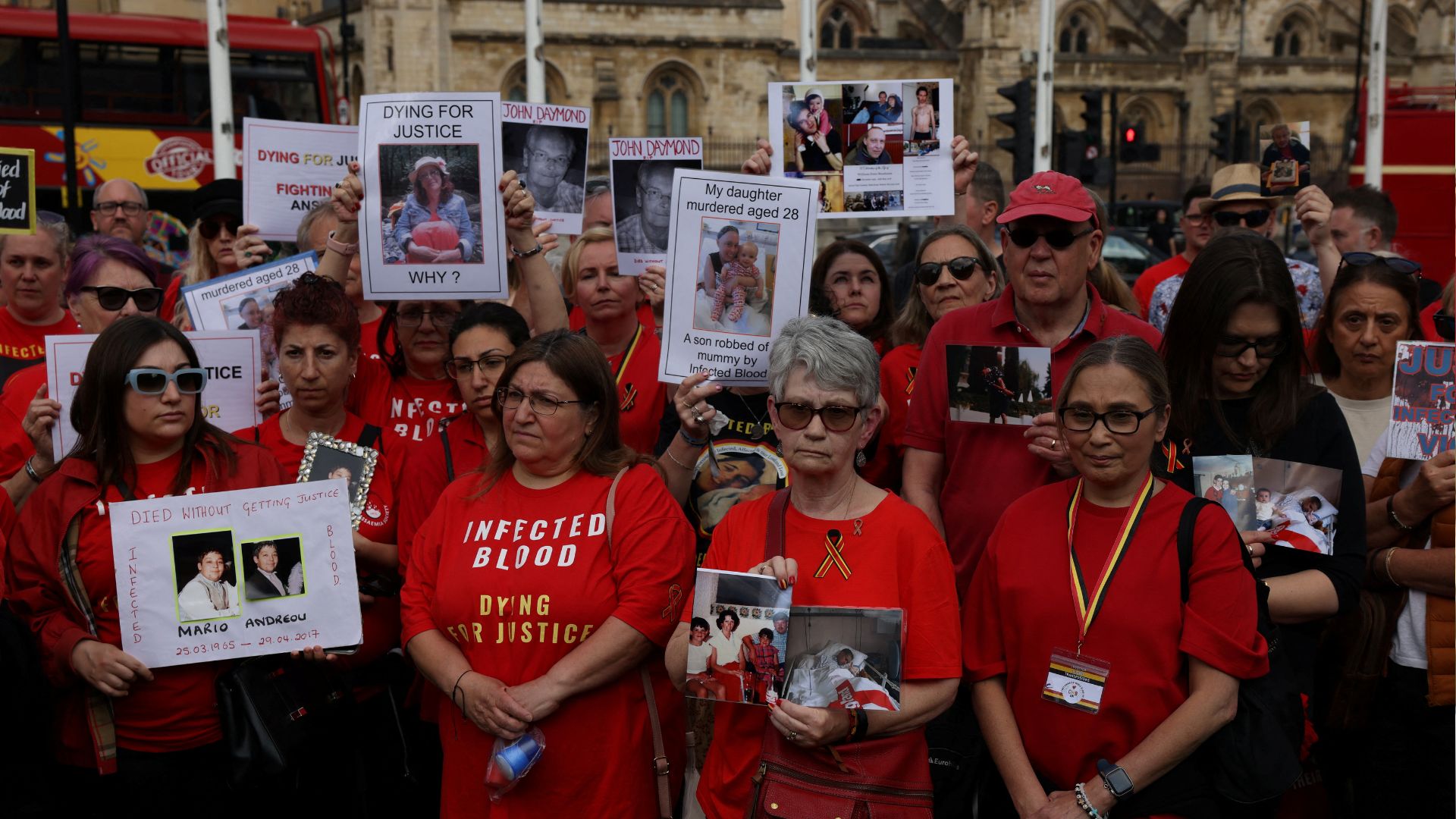 People impacted by the contaminated blood scandal gather in Westminster for a vigil to remember those that lost their lives ahead of the report's release. /Hollie Adams/Reuters
