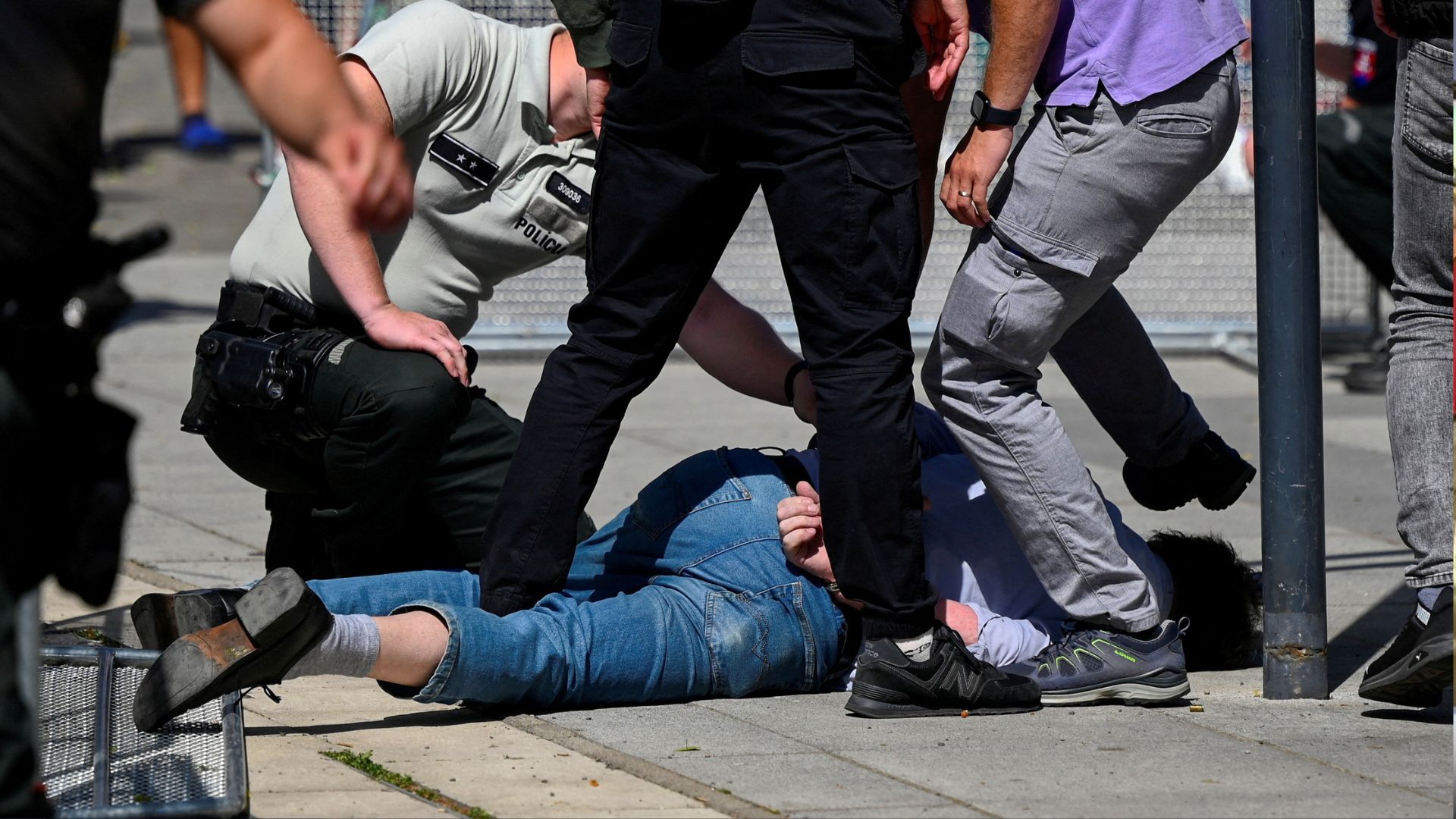 The suspect is detained after the shooting. /Radovan Stoklasa/Reuters