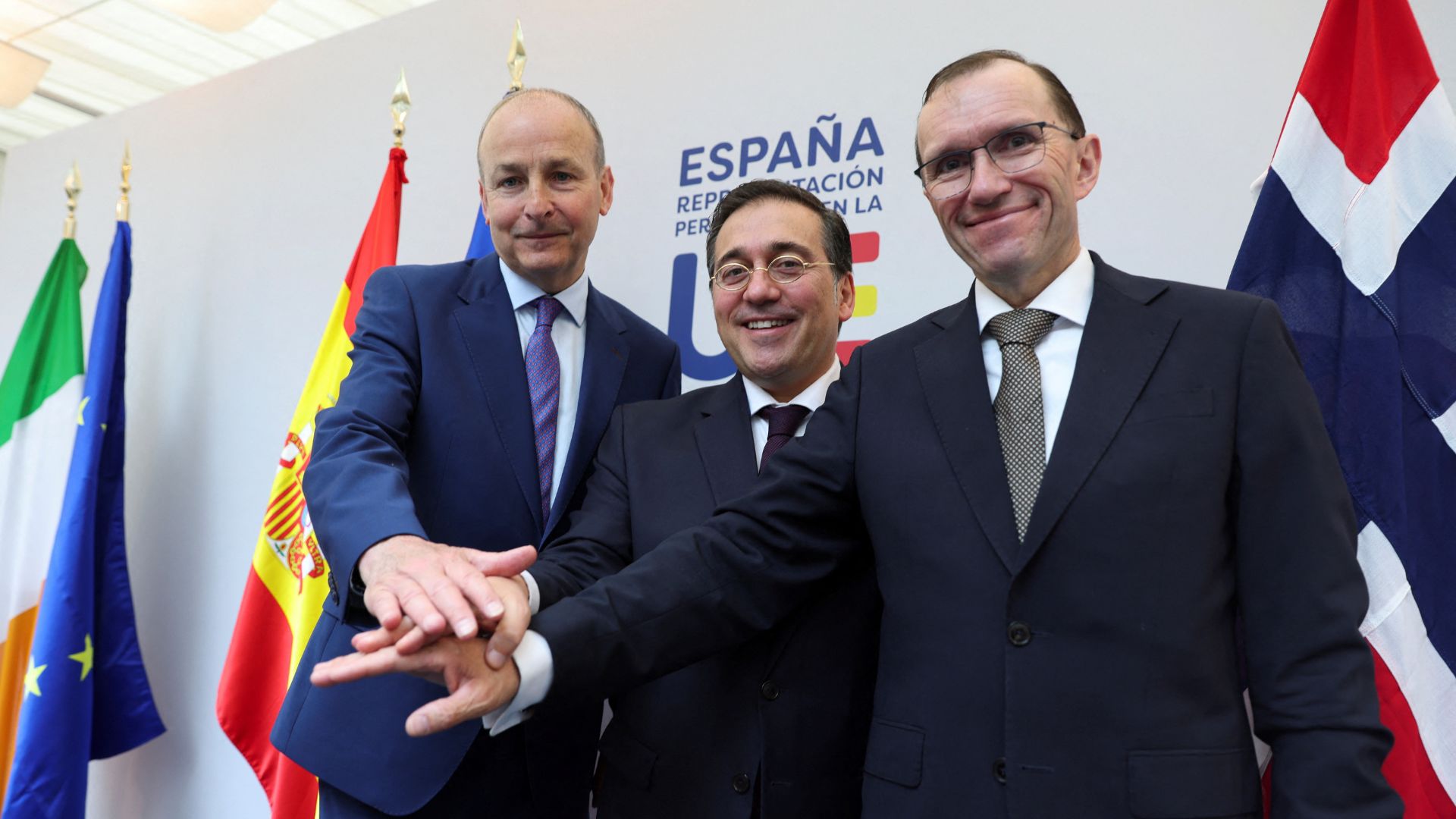 Spanish Foreign Minister Jose Manuel Albares, Norway's Foreign Minister Espen Barth Eide and Ireland's Foreign Minister Micheal Martin gesture after a press conference in Brussels. /Johanna Geron/Reuters