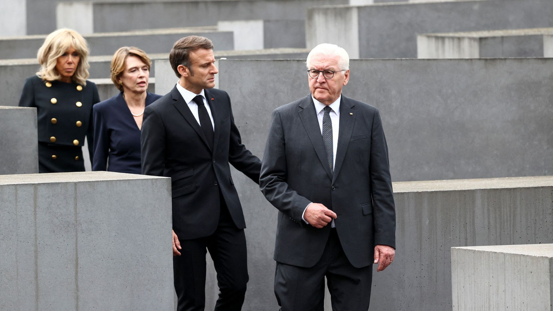 French President Emmanuel Macron, German President Frank-Walter Steinmeier and first ladies Brigitte Macron and Elke Buedenbender visit the Berlin's Holocaust Memorial. /Liesa Johannssen/Reuters
