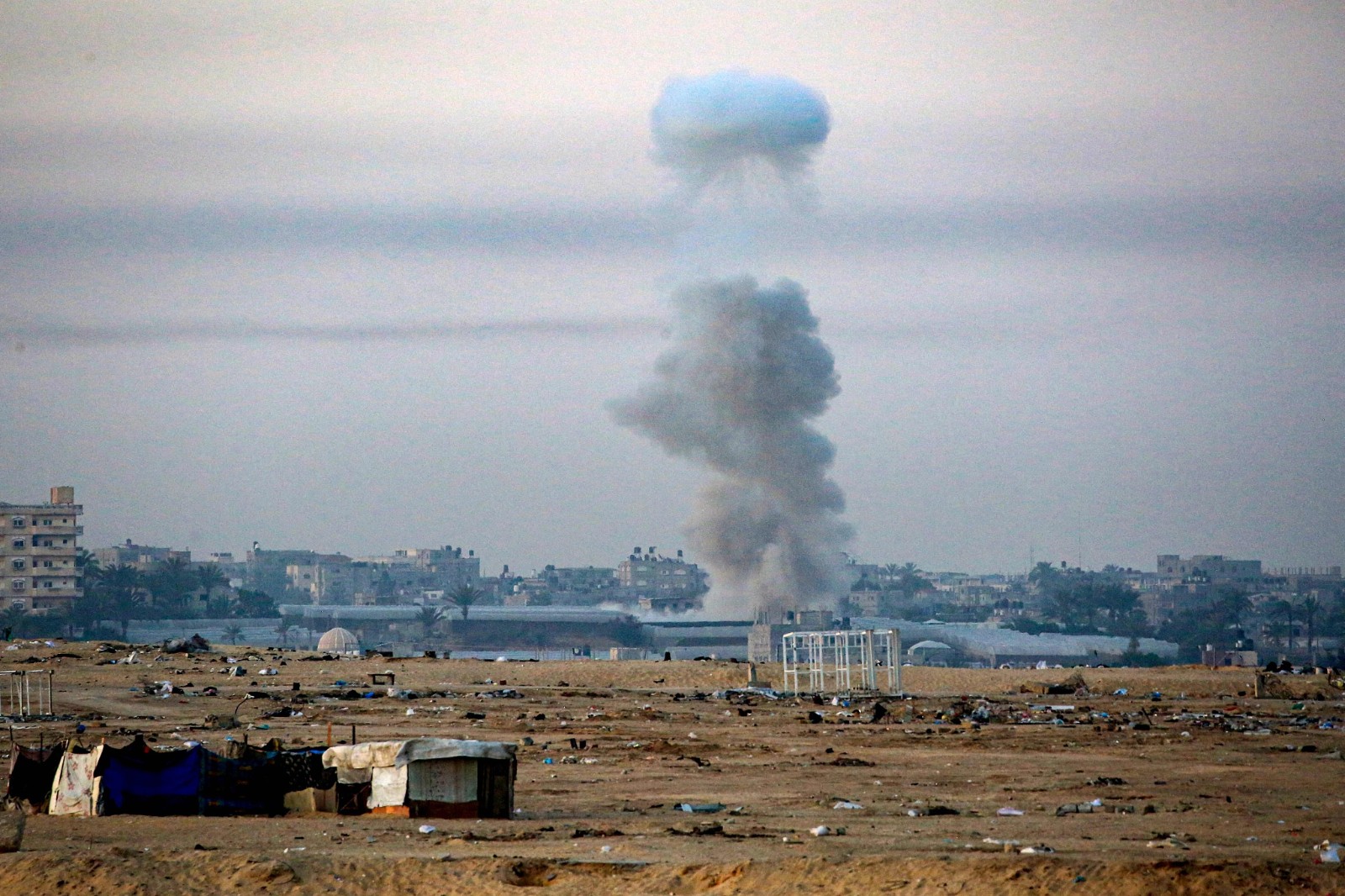 Smoke billows following Israeli bombardment /Eyad Baba/Reuters