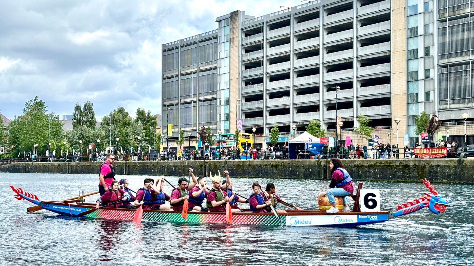 Dragon Boat Racing participants get ready for the competition at Salford Quays. /CGTN

