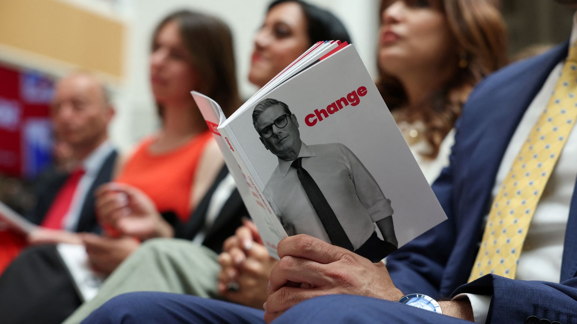 A person holds Britain's Labour Party election manifesto during its launch in Manchester. /Phil Noble/Reuters
