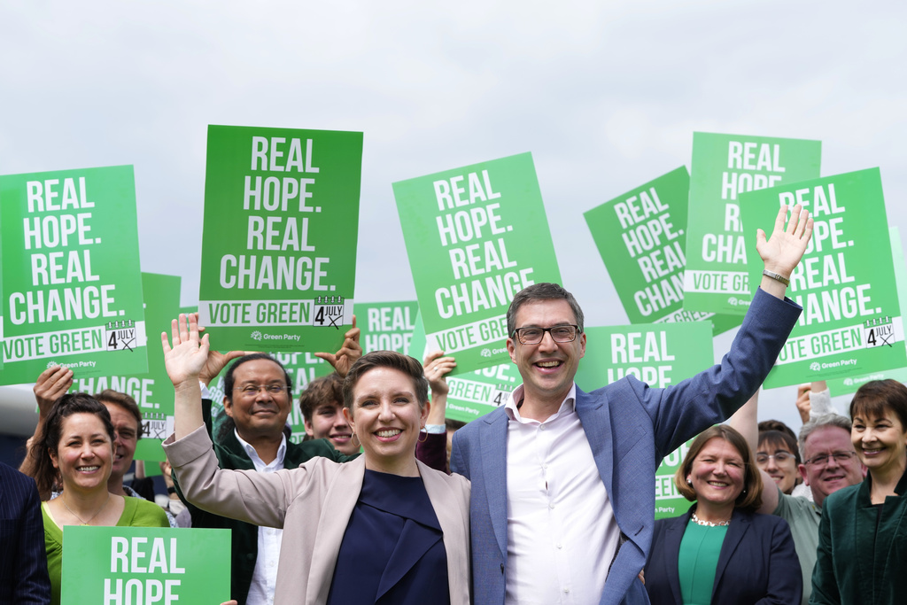 Green Party co-leaders Adrian Ramsay and Carla Denyer with supporters in Hove, UK, June 12, 2024. Kirsty Wigglesworth/AP.