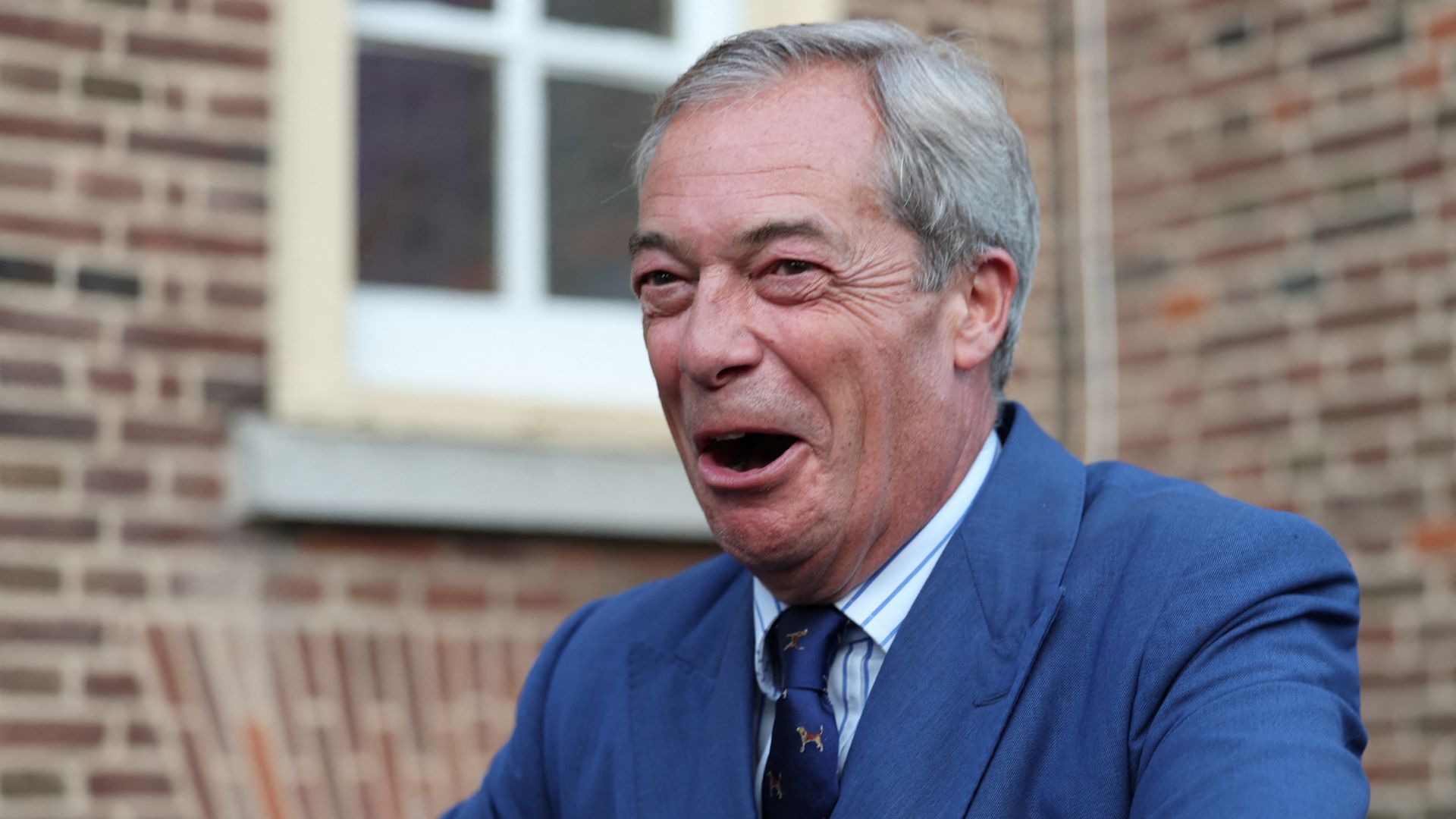 Britain's Reform UK Party Leader Nigel Farage reacts following a campaign event in Clacton-on-Sea. /Isabel Infantes/Reuters