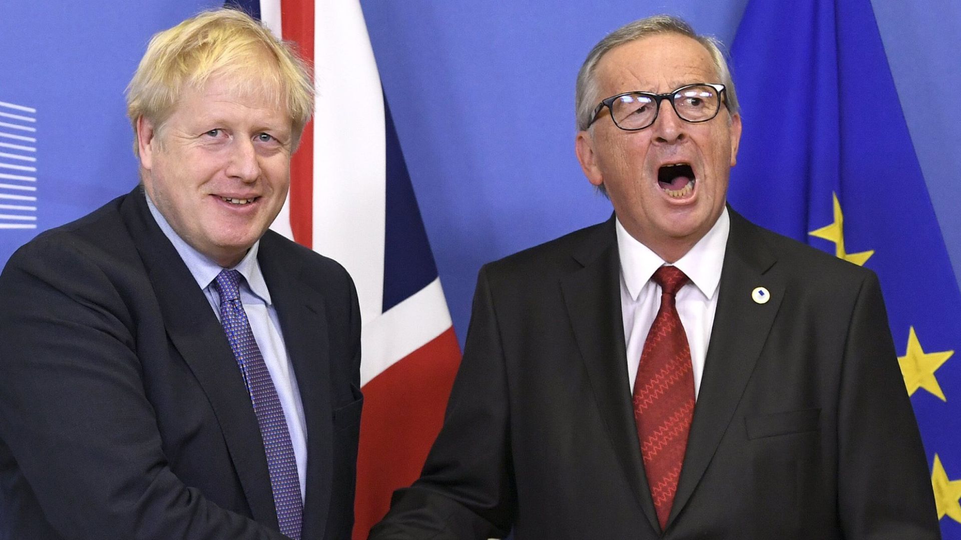 Johnson and European Commission President Juncker announce that an agreement on the Brexit agreement has been reached, on October 17. /Didier Lebrun/Photo News via Getty Images
