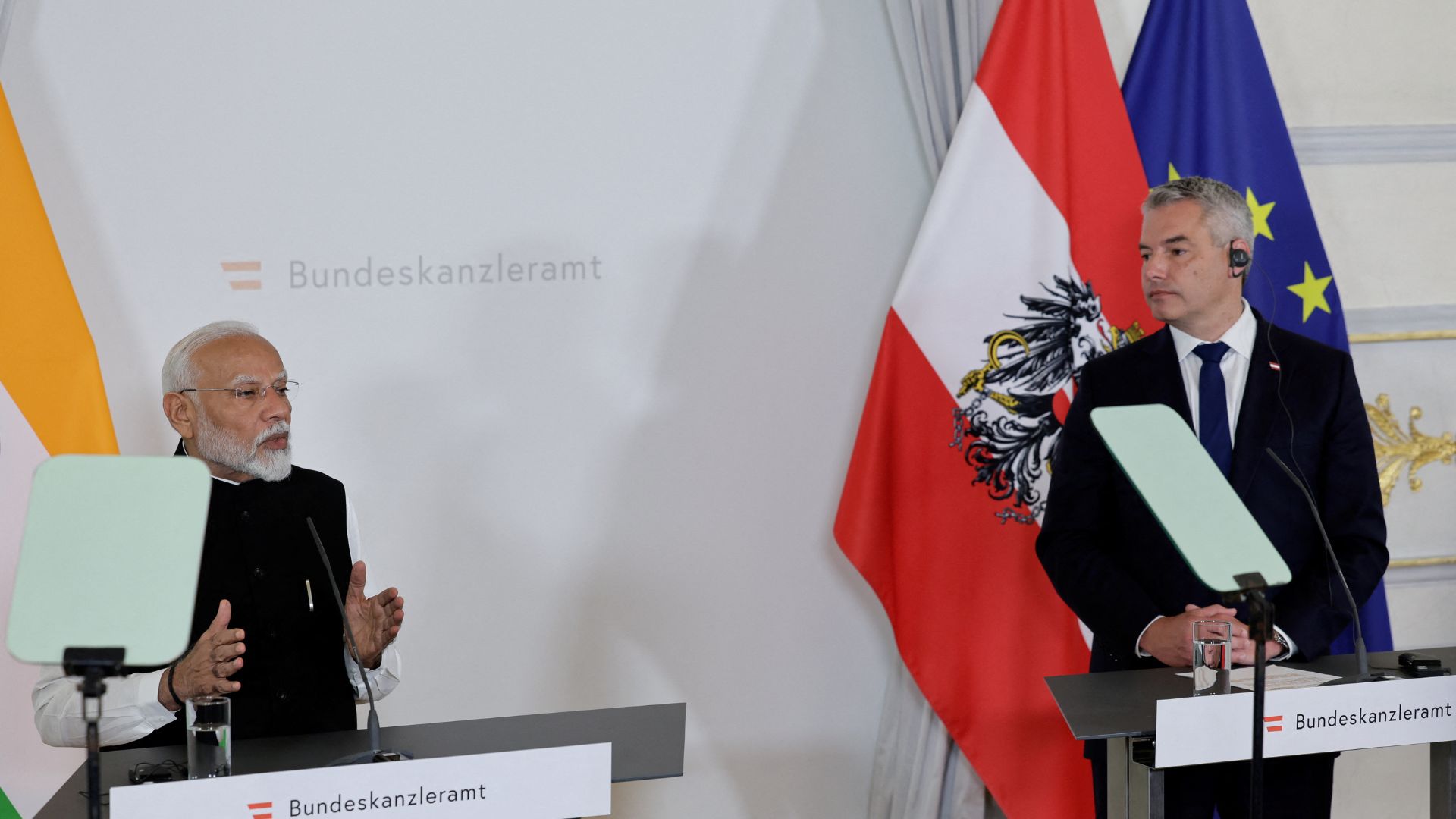 Indian PM Narendra Modi speaks during a press conference with Austrian Chancellor Karl Nehammer in Vienna. /Leonhard Foeger/Reuters