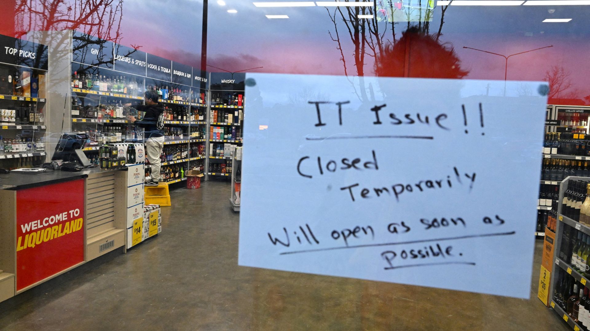 Problems spread around the world - including closing a liquor store in Canberra, Australia. /AAP Image/Lukas Coch via Reuters