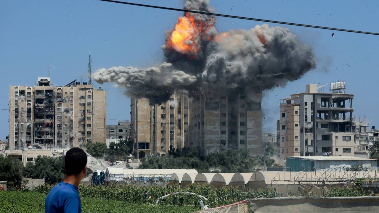 An explosion occurs following an Israeli air strike on a residential building in Nuseirat in the central Gaza Strip. /Omar Naaman/Reuters