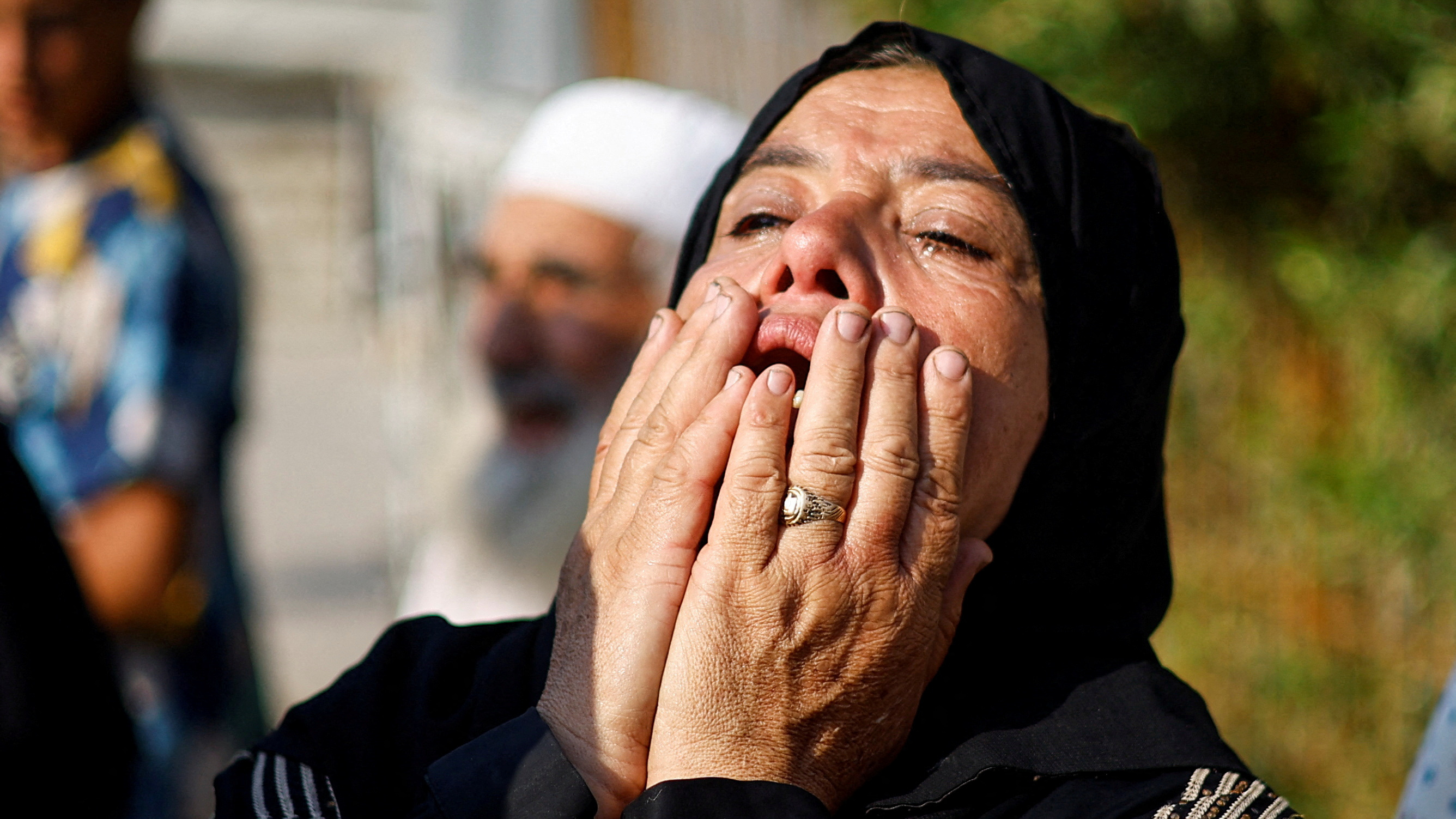 A mourner at a funeral of Palestinians at Nasser hospital, in Khan Younis. /Mohammed Salem/Reuters