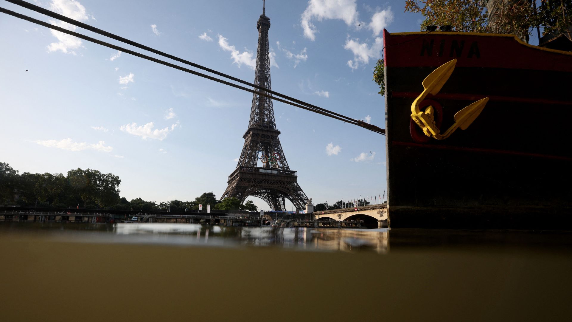 The Seine remains too polluted for the men's individual triathlon to take place - with fears of further delays caused by rain. /Fabrizio Bensch/Reuters