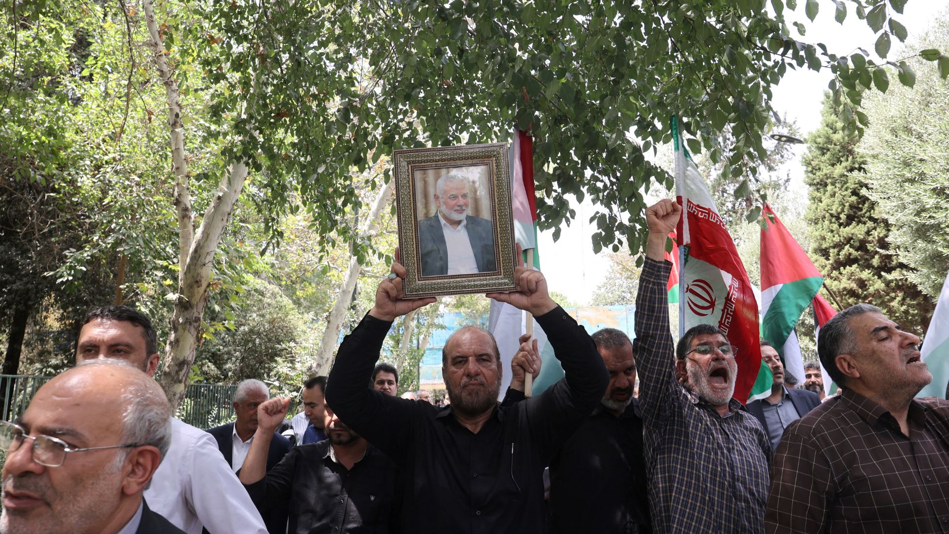 A crowd gathers in Tehran to mourn Haniyeh. /Majid Asgaripour/WANA/Reuters