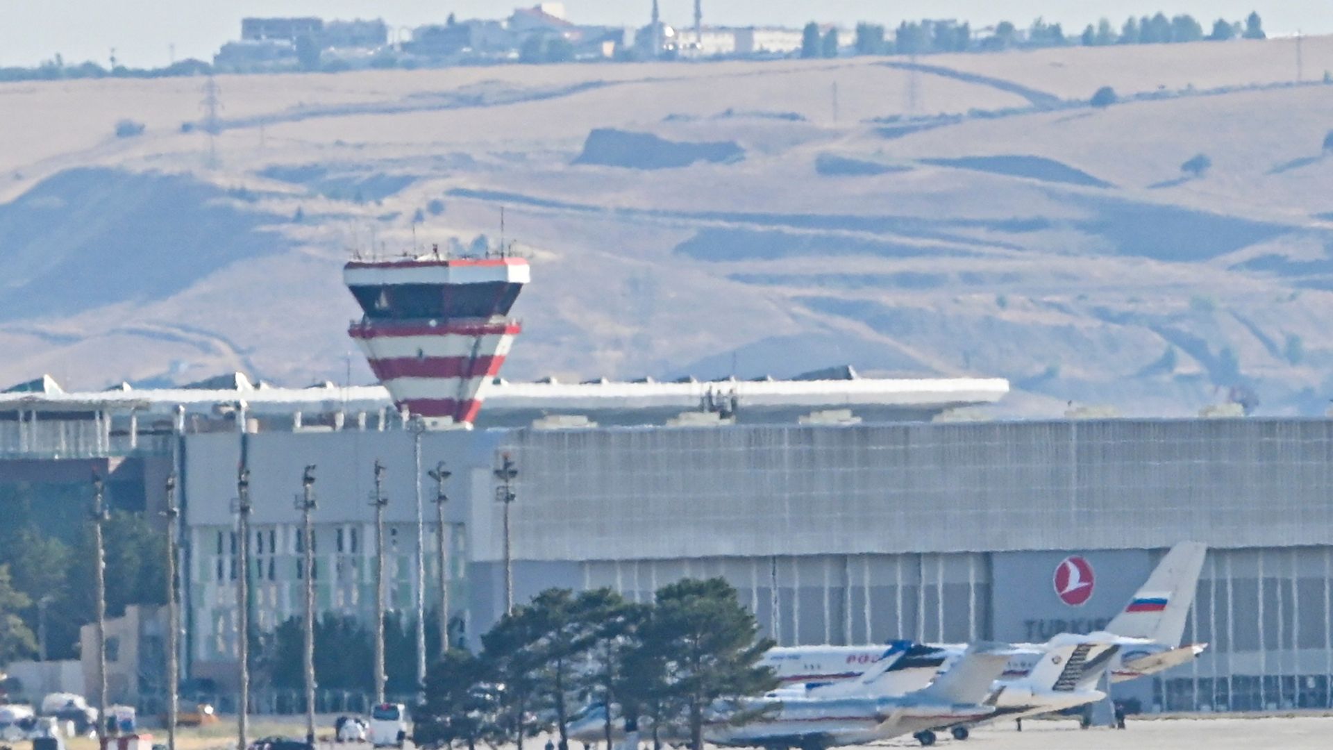 Planes believed to be carrying prisoners coming from Russia upon their arrival at Ankara on Thursday./ AP