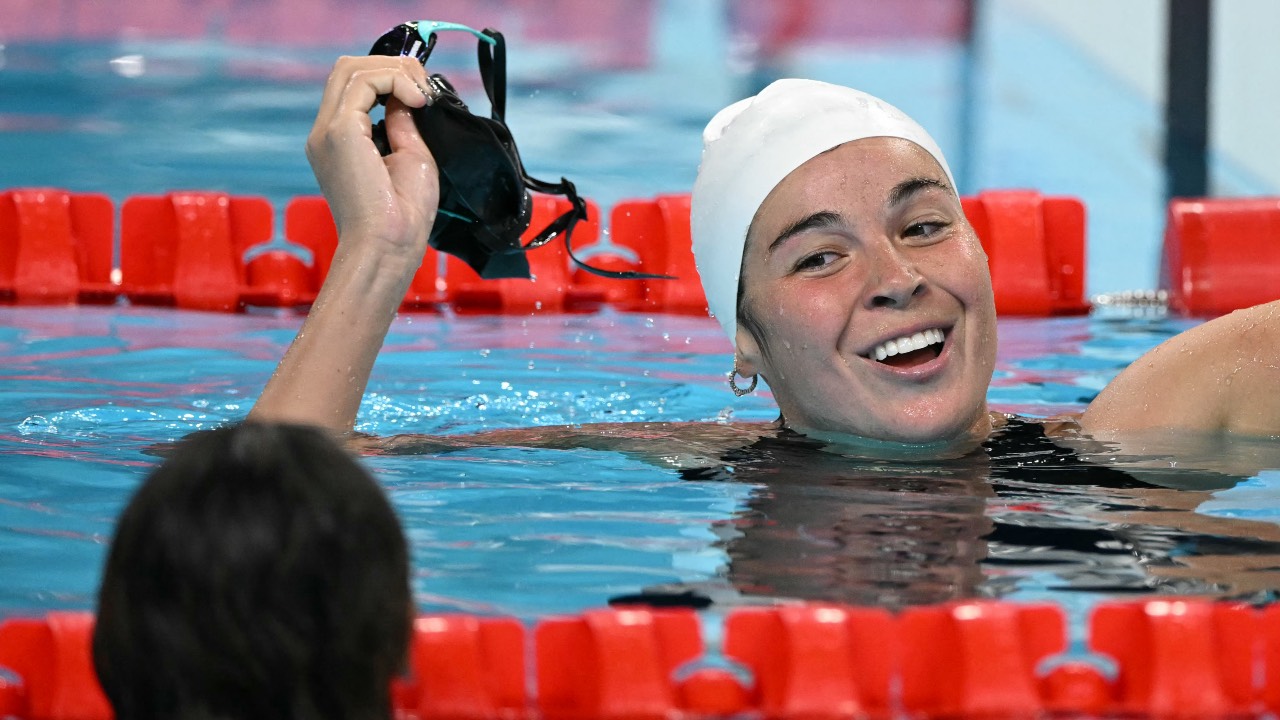 Palestine's Valerie Rose Tarazi reacts after competing in a heat of the women's 200m individual medley swimming event during the Paris 2024 Olympic Games at the Paris La Defense Arena in Nanterre, west of Paris. 
/Jonathan Nackstrand/AFP