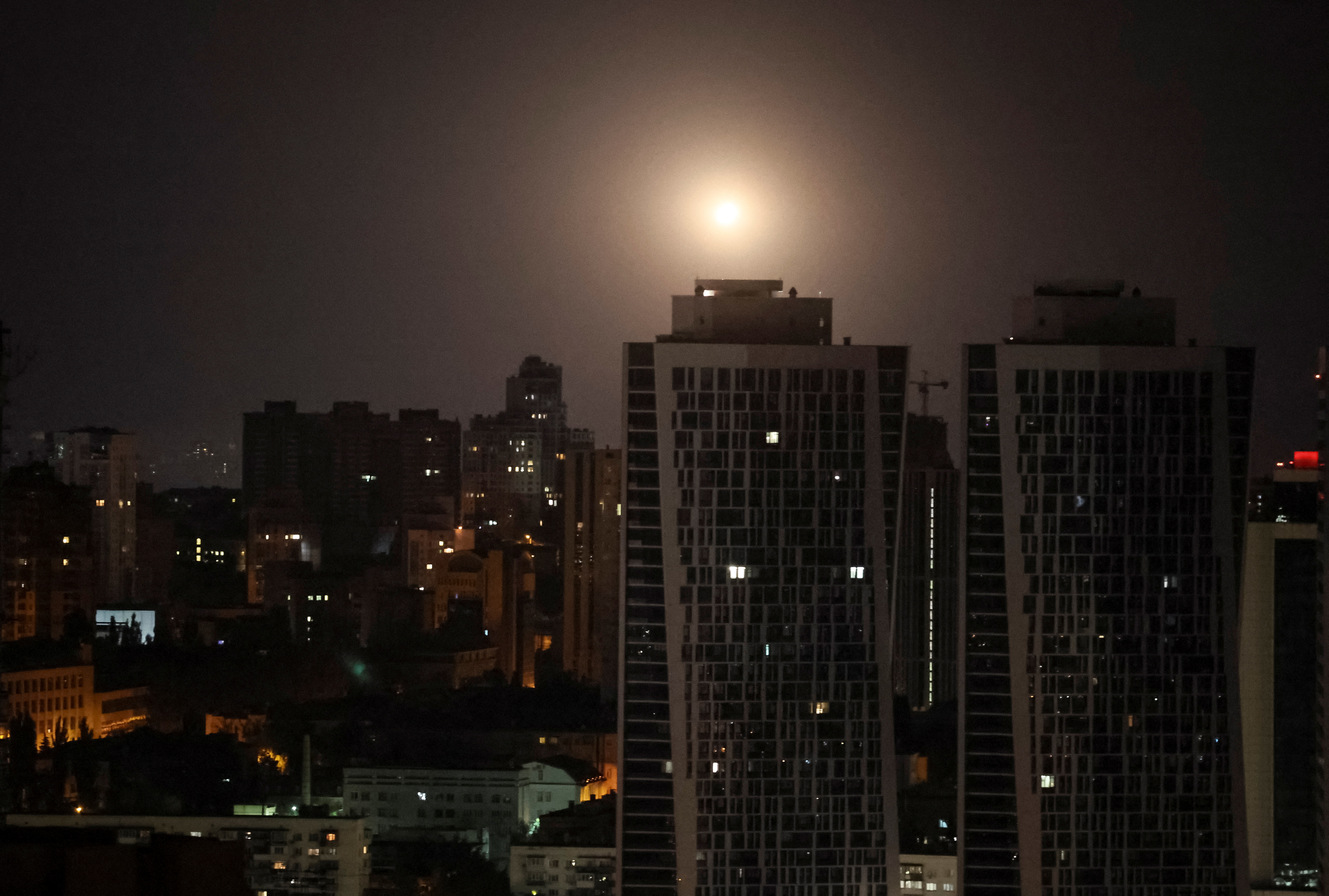 An explosion is seen in the sky over the city during a Russian missile and drone strike, amid Russia's attack on Ukraine in Kyiv. /Gleb Garanich/Reuters