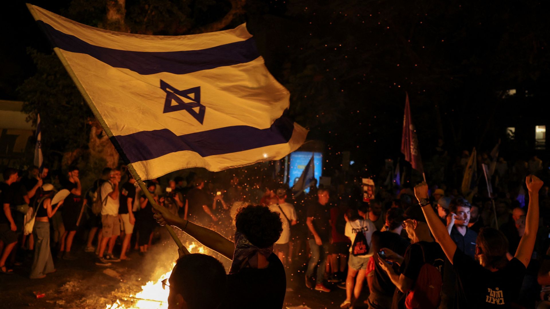 People rally in Tel Aviv to protest against the Israeli government and to show support for hostages. /Florion Goga/Reuters
