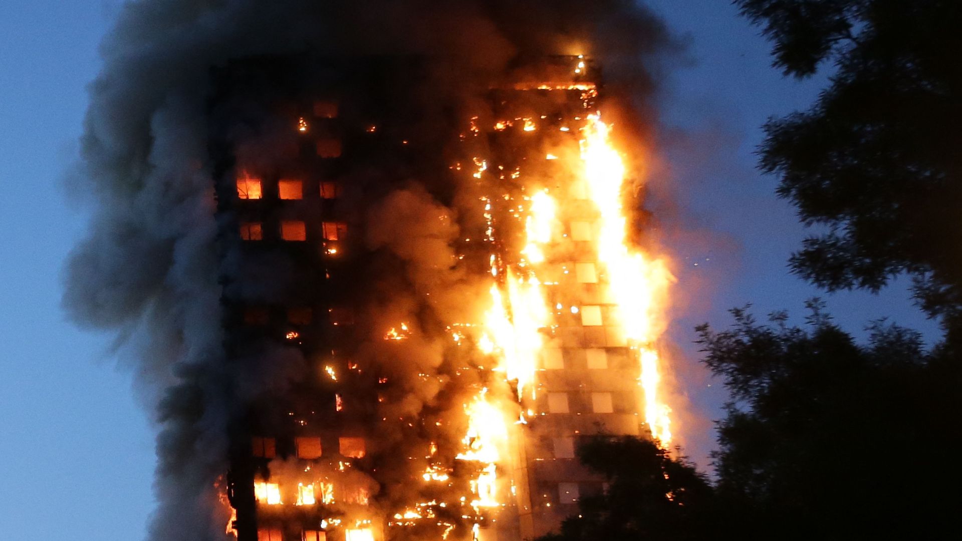 The 2017 fire at Grenfell Tower killed 72 people in Britain's worst residential fire since World War II. /Daniel Leal/AFP
