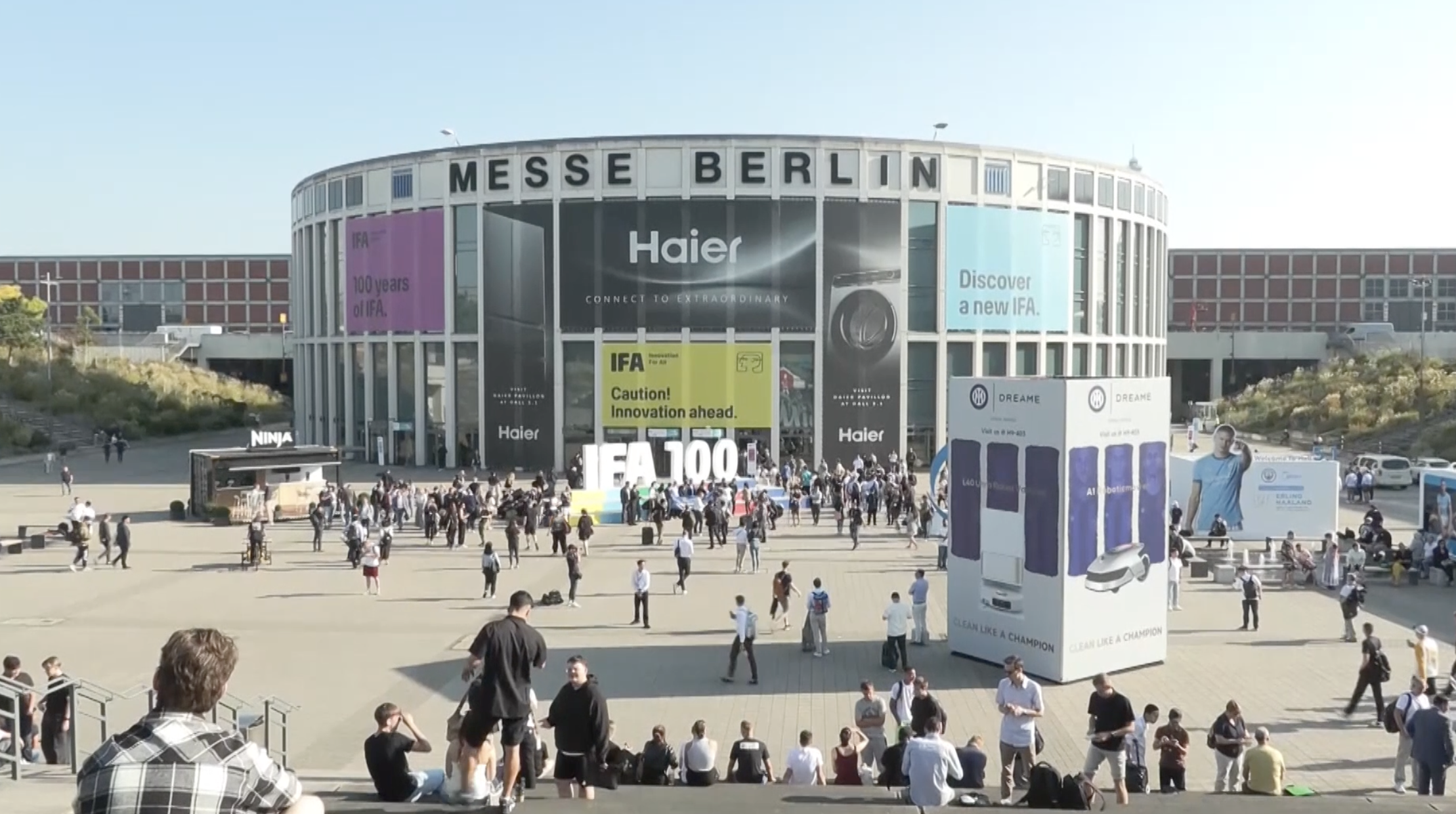 Attendees gather at the Messe Berlin convention centre. /CGTN