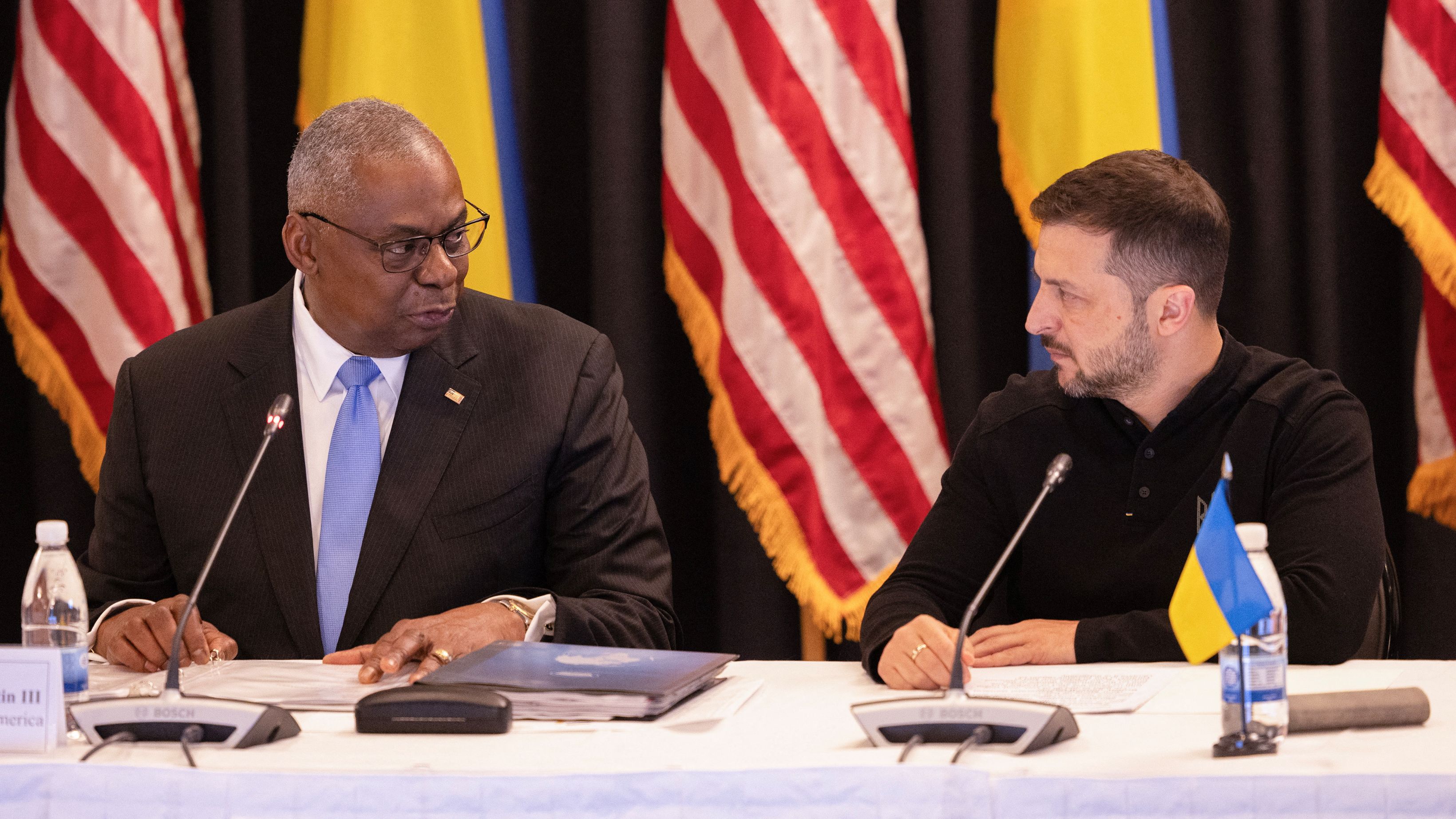 U.S. Defense Secretary Lloyd Austin and Ukrainian President Volodymyr Zelenskyy in Germany on Friday. /Heiko Becker/Reuters