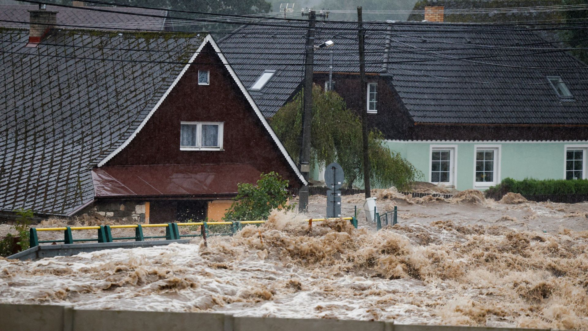 Floodwaters rage through Lipova Lazne in Czechia. /David W Cerny/Reuters