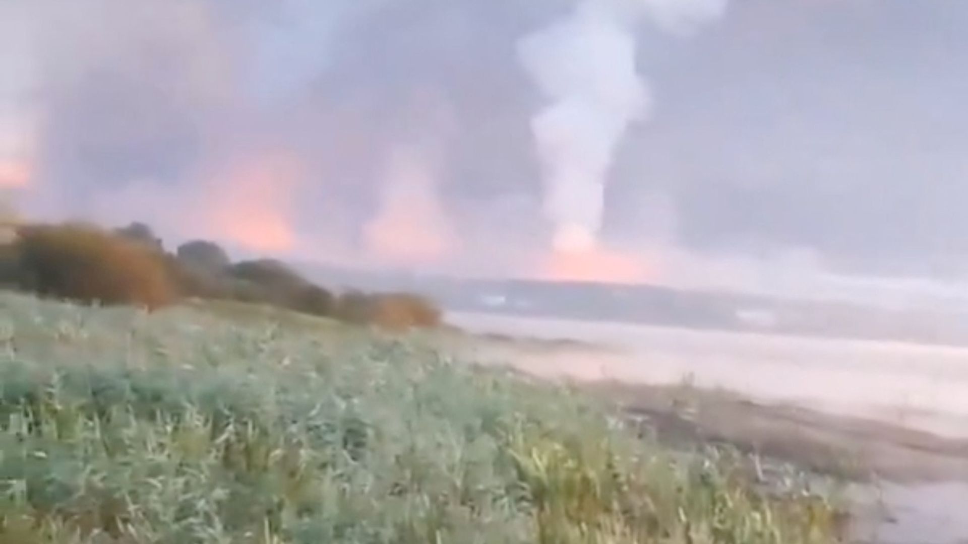 Smoke and flames rise following a Ukrainian drone attack in Toropets in this screen grab obtained from a social media video. /Social media/via Reuters