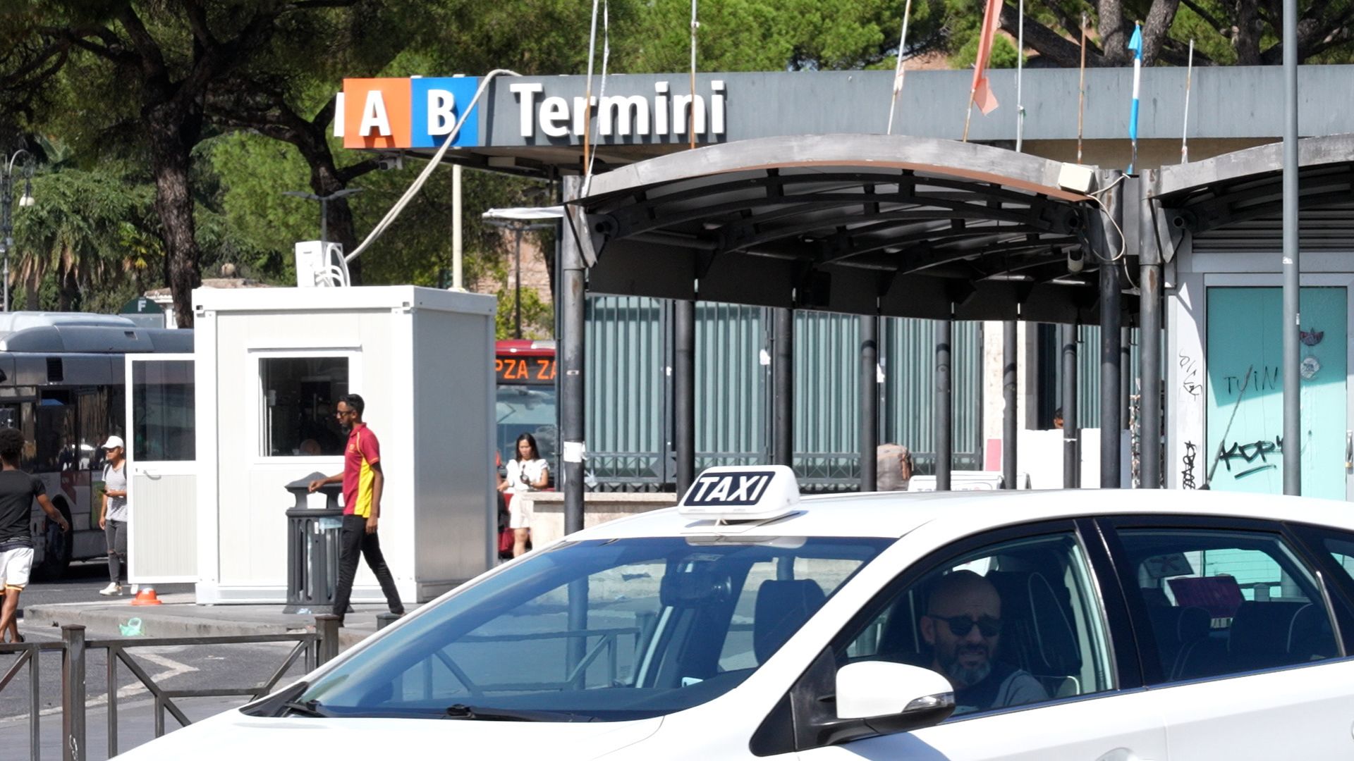 Transport hubs such as the central Termini train station can see long queues outside. /Giles Gibson/CGTN