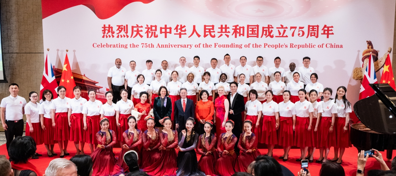 A family photo at the reception marking the 75th anniversary of the founding of the People's Republic of China. /Chinese Embassy in the UK