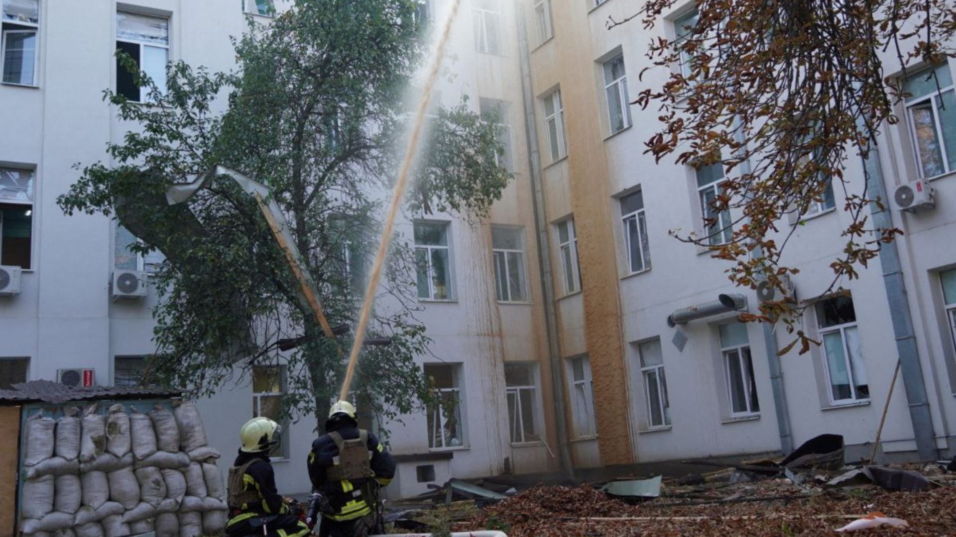 Firefighters work at a site of the medical center in Sumy. /State Emergency Service of Ukraine