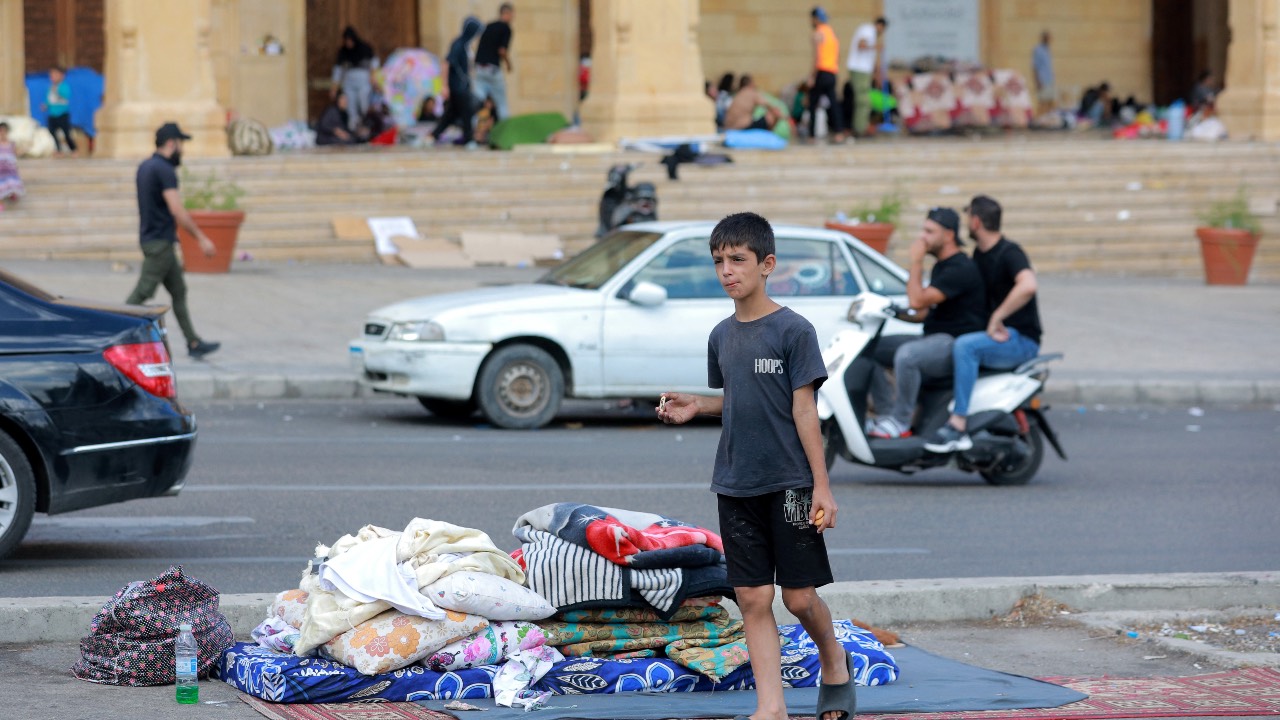 Internally displaced people are pictured in downtown Beirut. Intense Israeli attacks may have forced up to a million people to flee parts of Lebanon in possibly the worst displacement crisis in the small country's history. /Ibrahim Amro/AFP