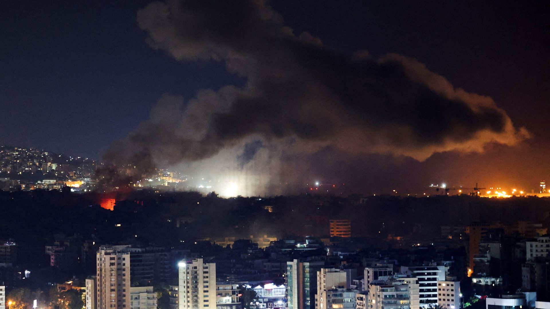 Smoke rises over Beirut's southern suburbs after a strike, as seen from Sin El Fil, Lebanon. /Amr Abdallah Dalsh/Reuters 
