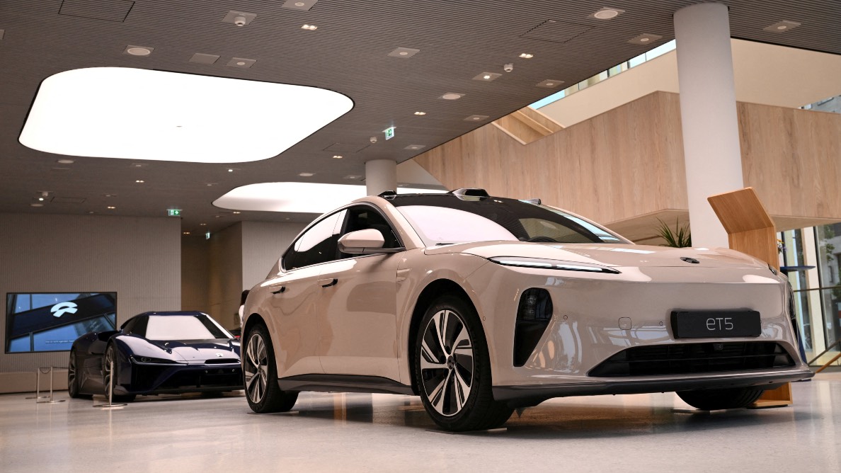 A NIO ET5 car model and the NIO EP9 sports car at the NIO House, showroom of the Chinese premium smart EV manufacturer in Berlin. /Annegret Hilse/Reuters