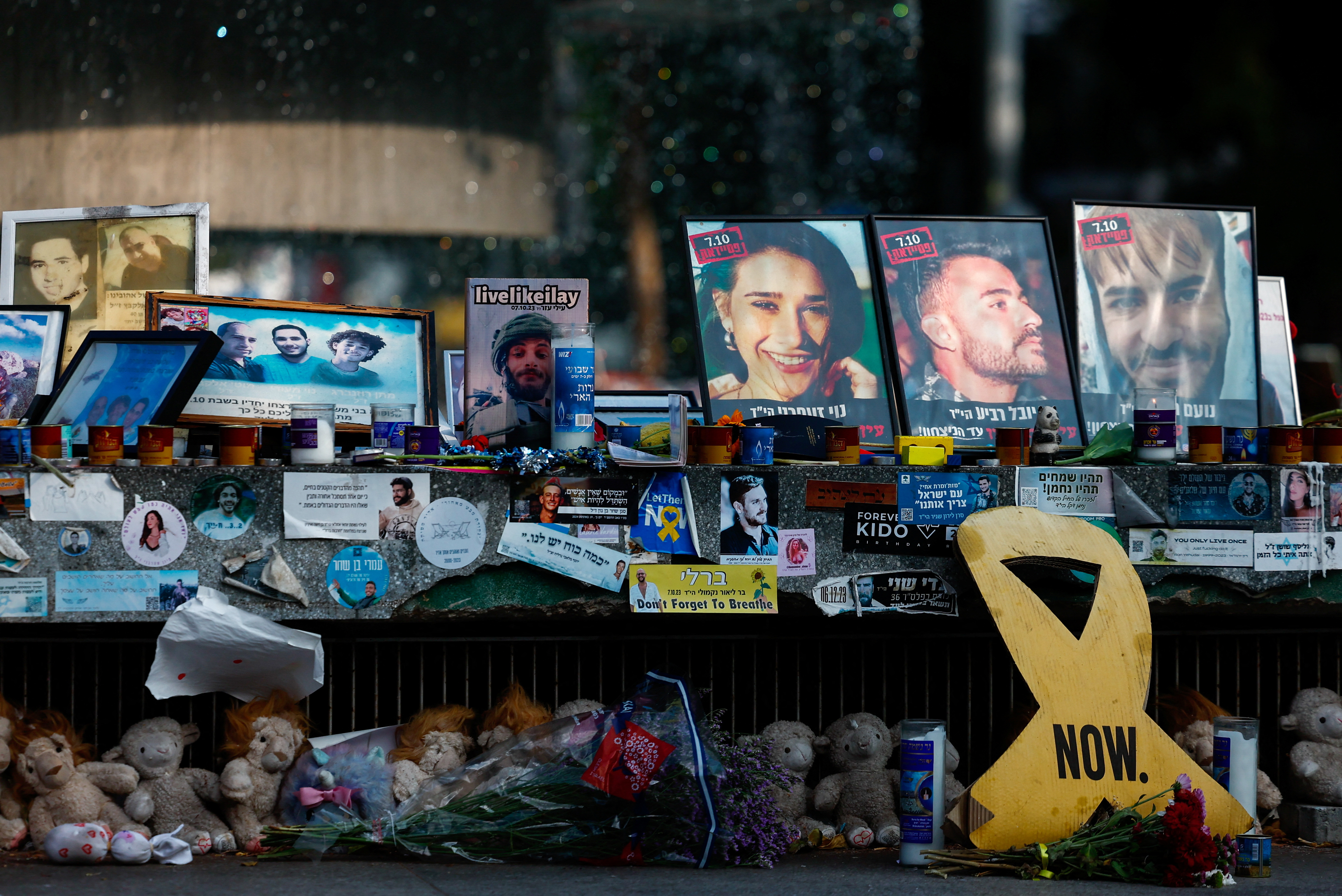 Pictures in Tel Aviv of hostages kidnapped during the deadly October 7 attack. /Gonzalo Fuentes/Reuters