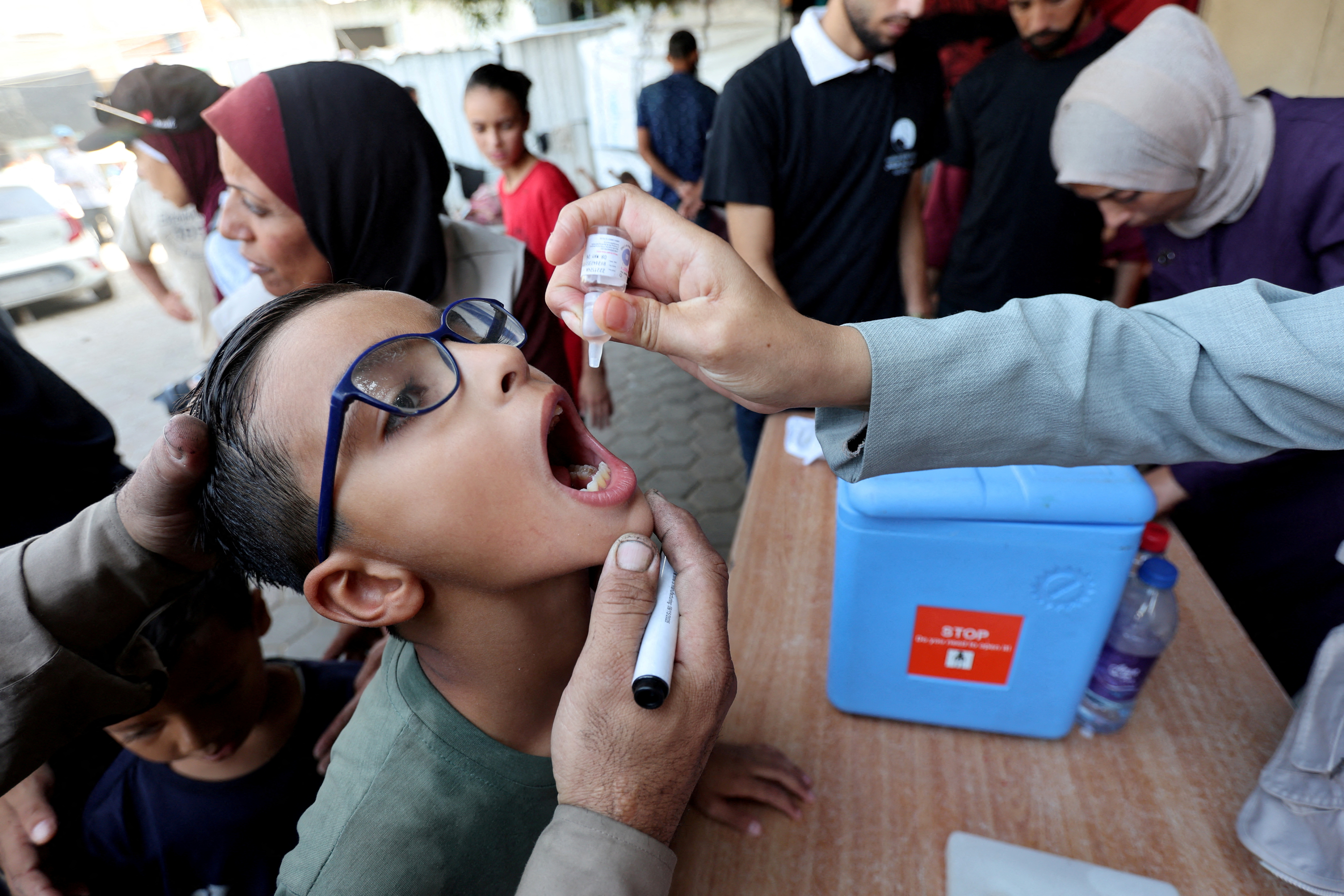 Palestinian child is vaccinated against polio during the second round of a vaccination campaign in Deir Al-Balah in the central Gaza Strip. /Ramadan Abed/Reuters/File