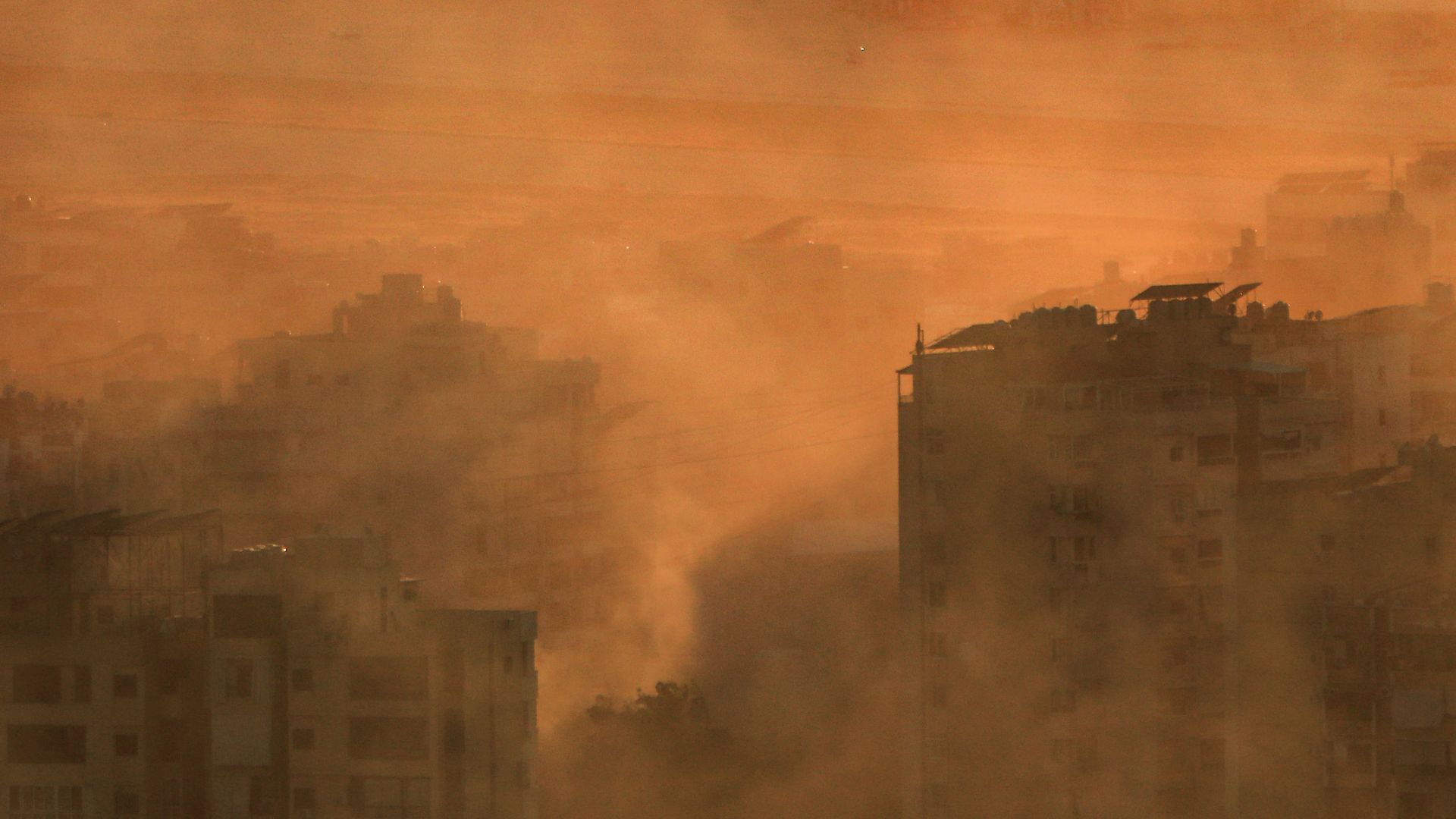 A neighborhood of Beirut's southern suburbs near one of the runways of Beirut International Airport following an Israeli airstrike. /AFP