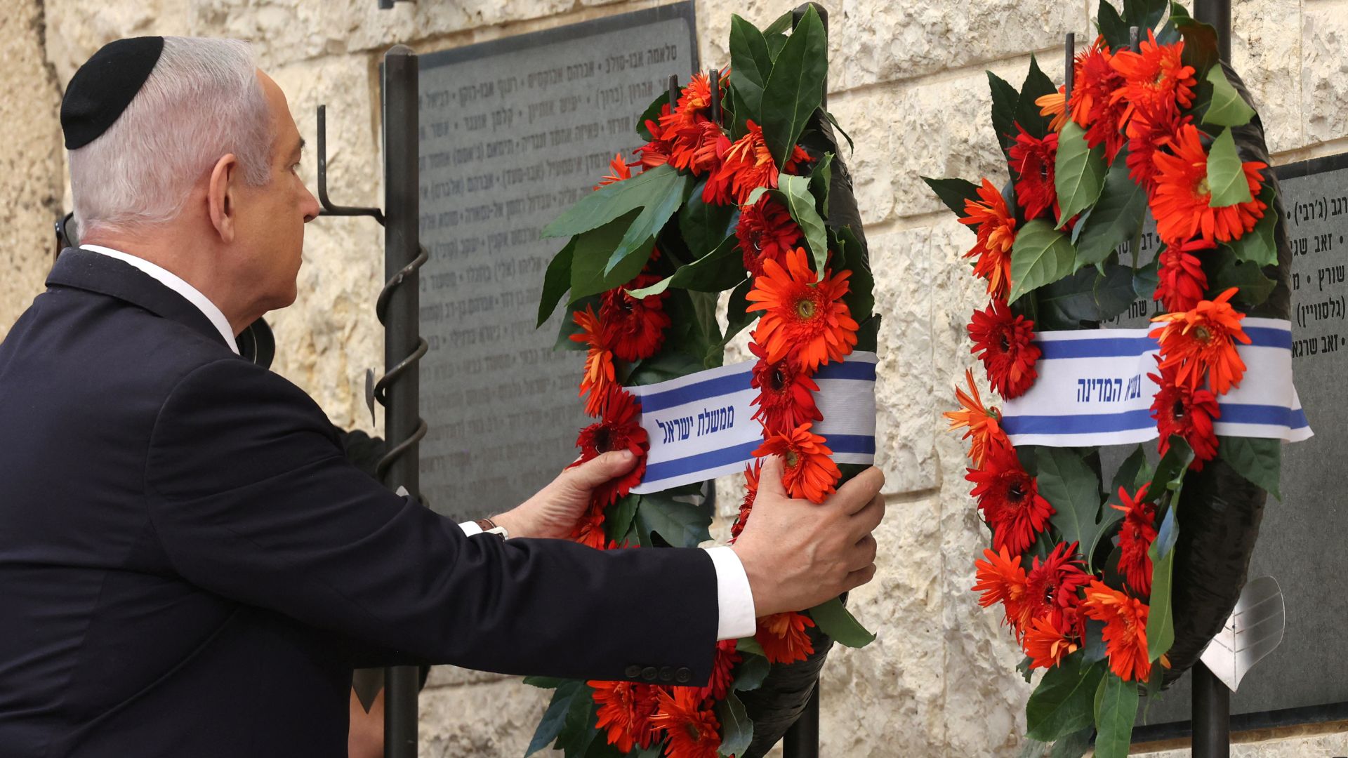 Israel's Prime Minister Benjamin Netanyahu places a wreath during a memorial ceremony for the Hamas attack on October 7 last year at the Mount Herzl military cemetery in Jerusalem. /Gil Cohen-Magen/Reuters
