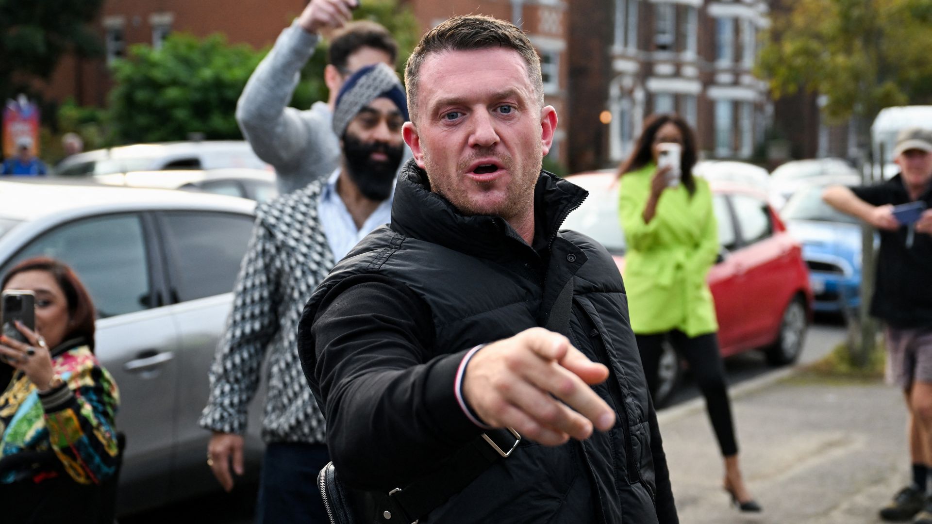 Stephen Yaxley-Lennon, known as Tommy Robinson, arrives at Folkestone Police Station on October 25. /Chris J Ratcliffe/Reuters