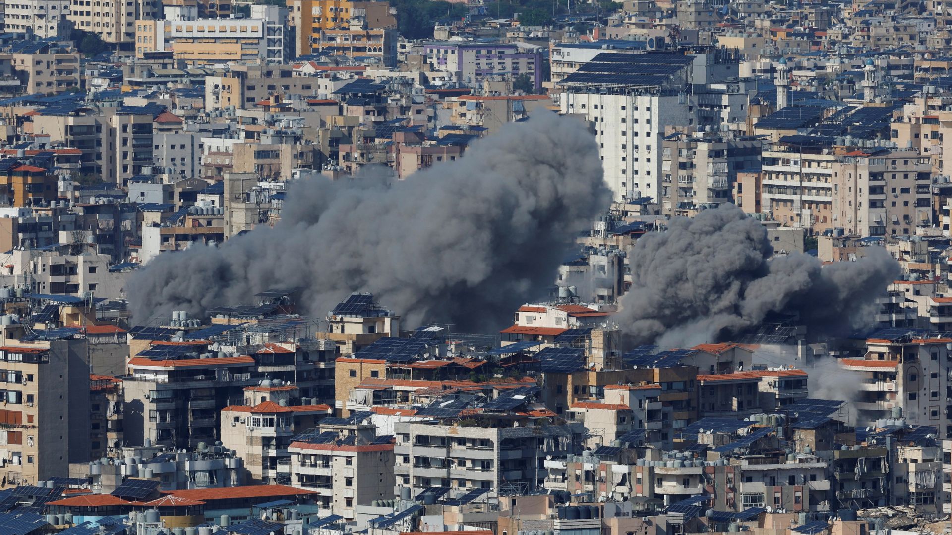 Smoke billows over Beirut's southern suburbs after an Israeli strike. /Adnan Abidi/Reuters