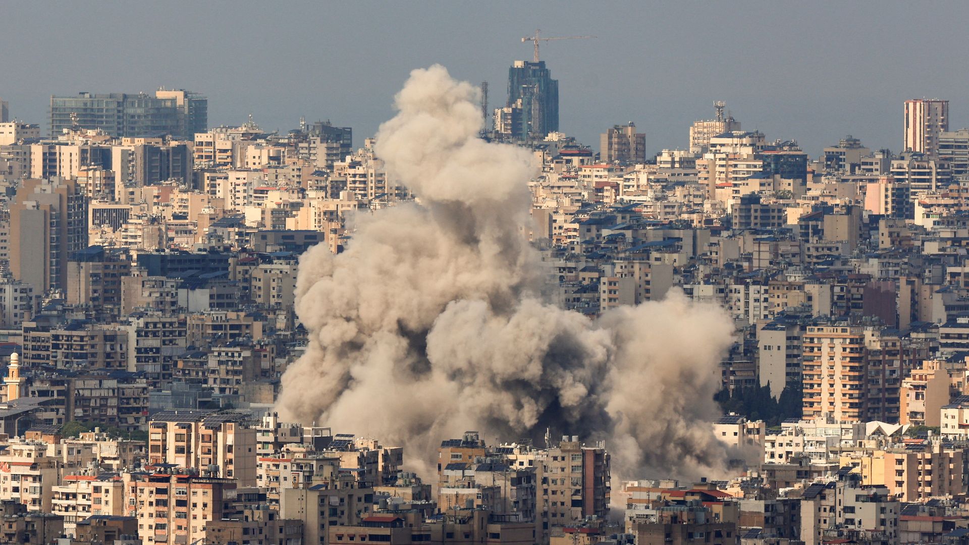 Smoke billows over Beirut's southern suburbs after an Israeli strike, as seen from Baabda, Lebanon on November 13. /Thaier Al-Sudani/Reuters