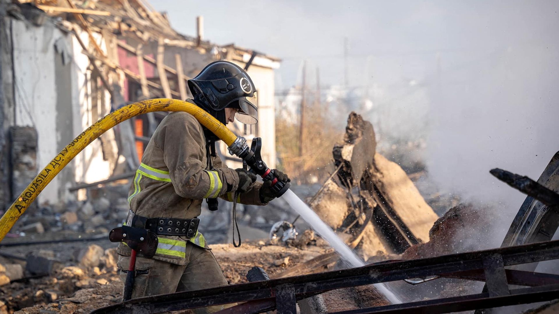 A firefighter works at the site of a residential area damaged by a Russian missile strike in Odesa. /Press service of the State Emergency Service of Ukraine in Odesa region/Handout