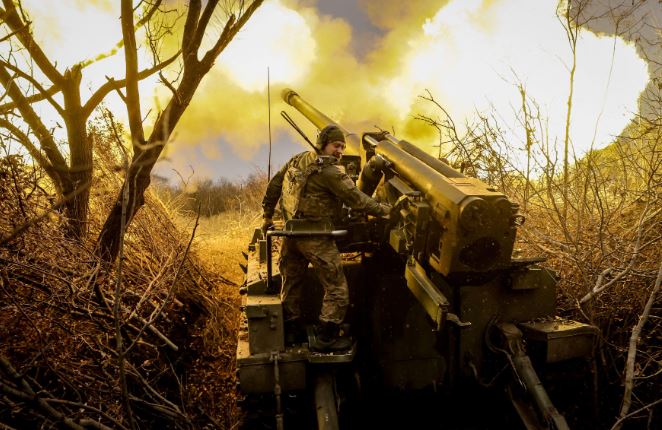 A serviceman of 24th Mechanized brigade fires a 2s5 