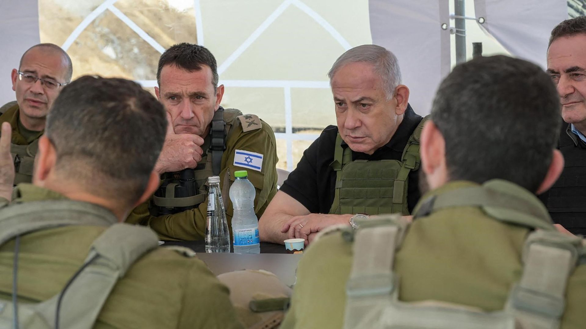 Netanyahu (centre right), alongside, Defence Minister Israel Katz (R) and army Chief-of-Staff Herzi Halevi (2nd L) during a briefing in the Netzarim Corridor on Tuesday. /GPO/AFP
