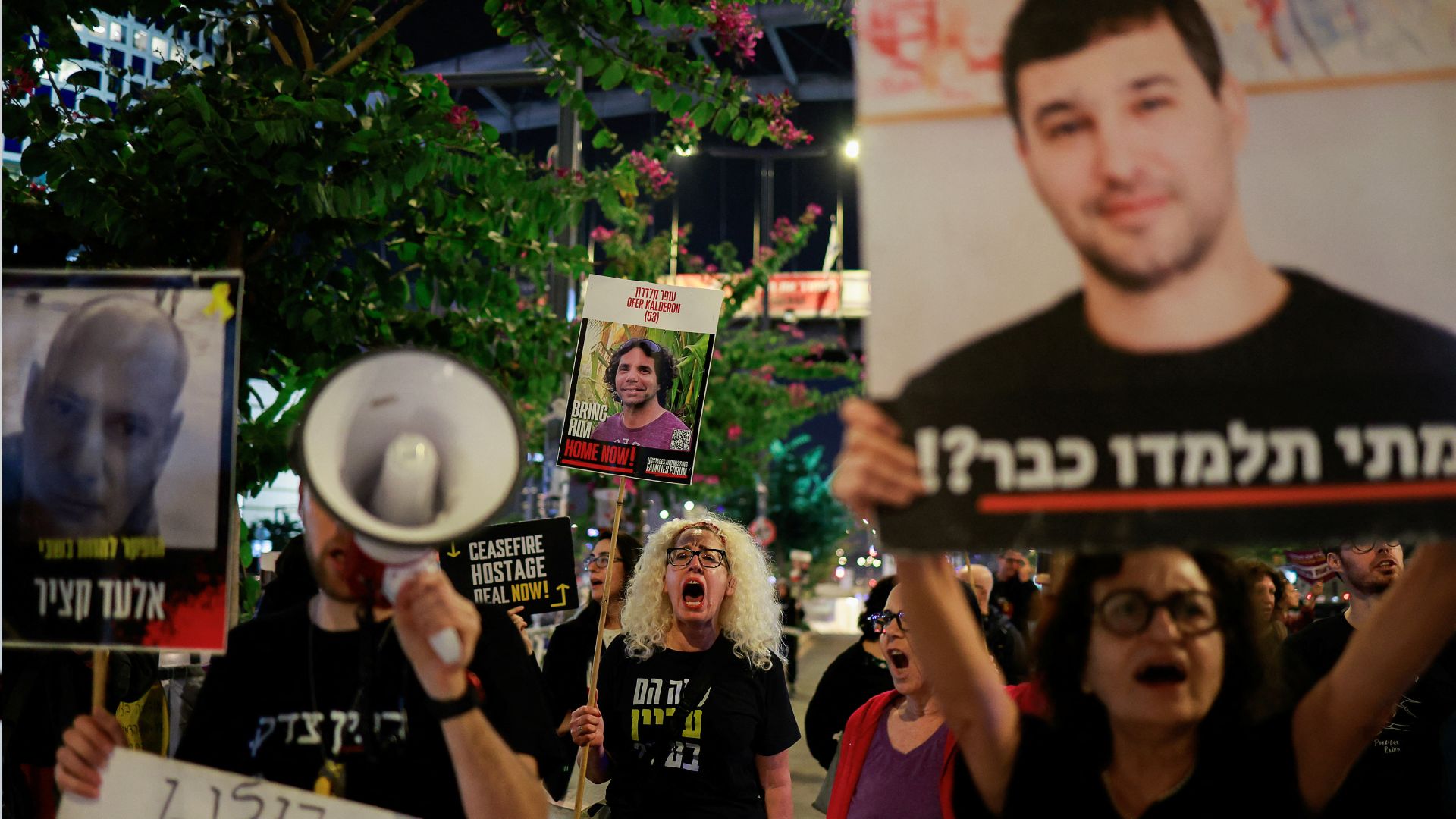 Israelis protest against their government's management of the ongoing conflict in Gaza between Israel and Hamas and to show support for the missing hostages, in Tel Aviv on Thursday. /Ammar Awad/Reuters
