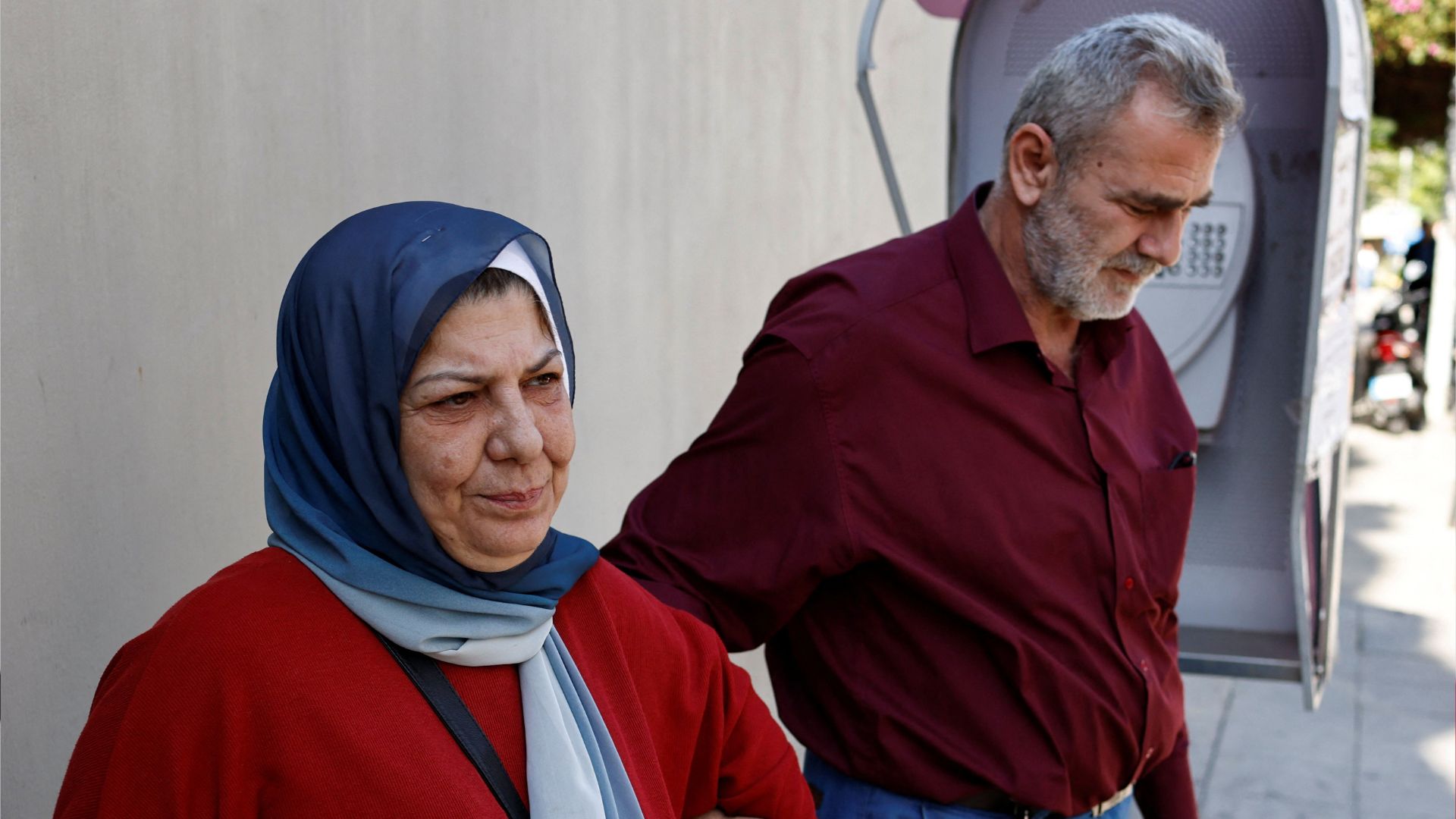 Abbas Haidar and Sanaa Shahrour, parents of Celine, outside Saint George Hospital University Medical Center where their daughter is being treated. /Thaier Al-Sudani/Reuters